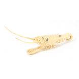 A MEIJI PERIOD JAPANESE SHIBAYAMA IVORY OKIMONO modelled as a lobster inset with various insects
