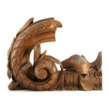 A 19TH CENTURY WALNUT CARVING OF A CARP next to a gadrooned scroll with reeds 49cm wide 38cm high