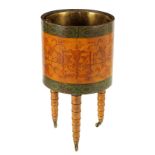 AN EARLY 19TH CENTURY TOLEWARE WINE COOLER having green symmetrical bands and floral red