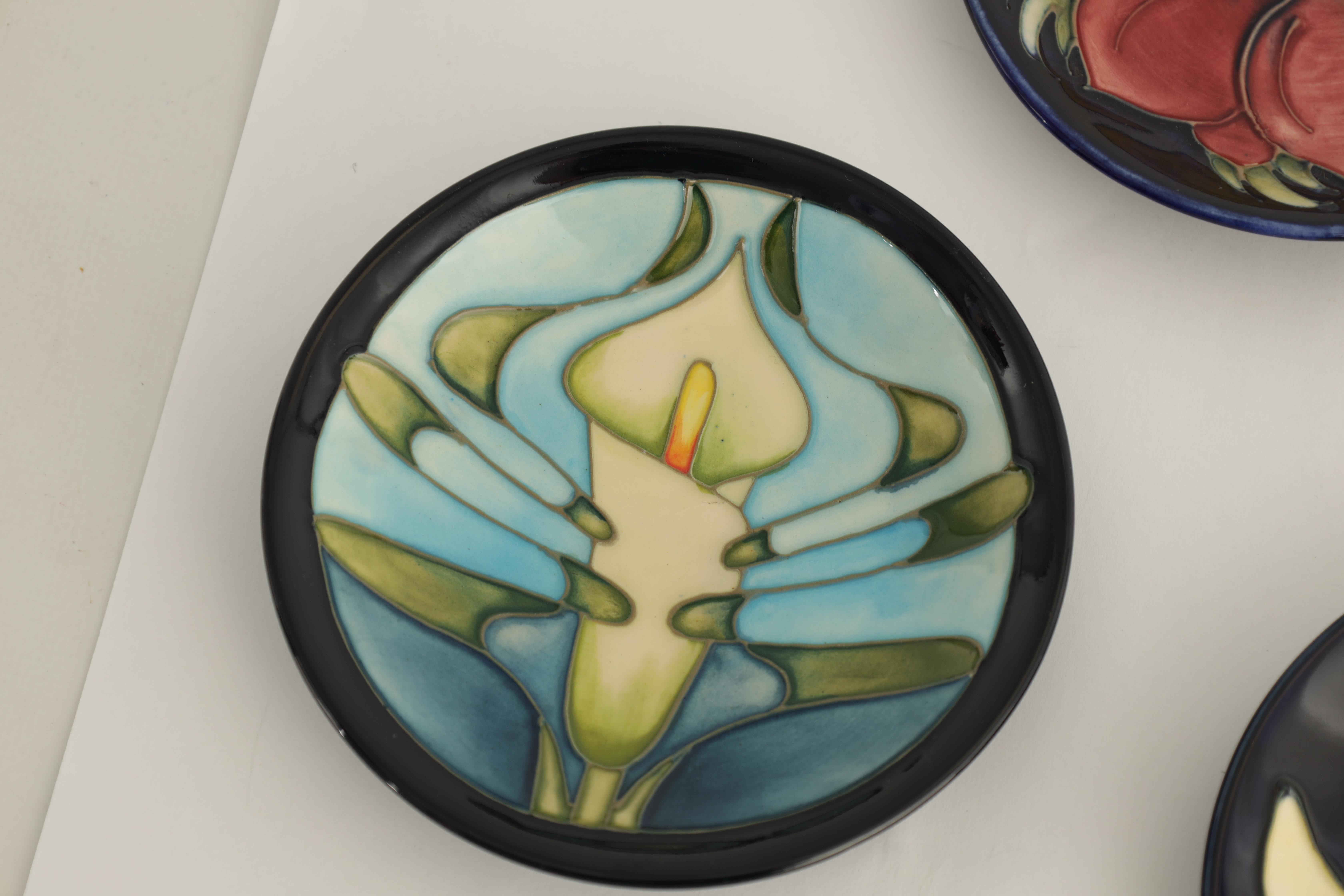 A MOORCROFT DARK BLUE GROUND PIN TRAY tube lined and decorated with a large water lily flowerhead - Image 3 of 7