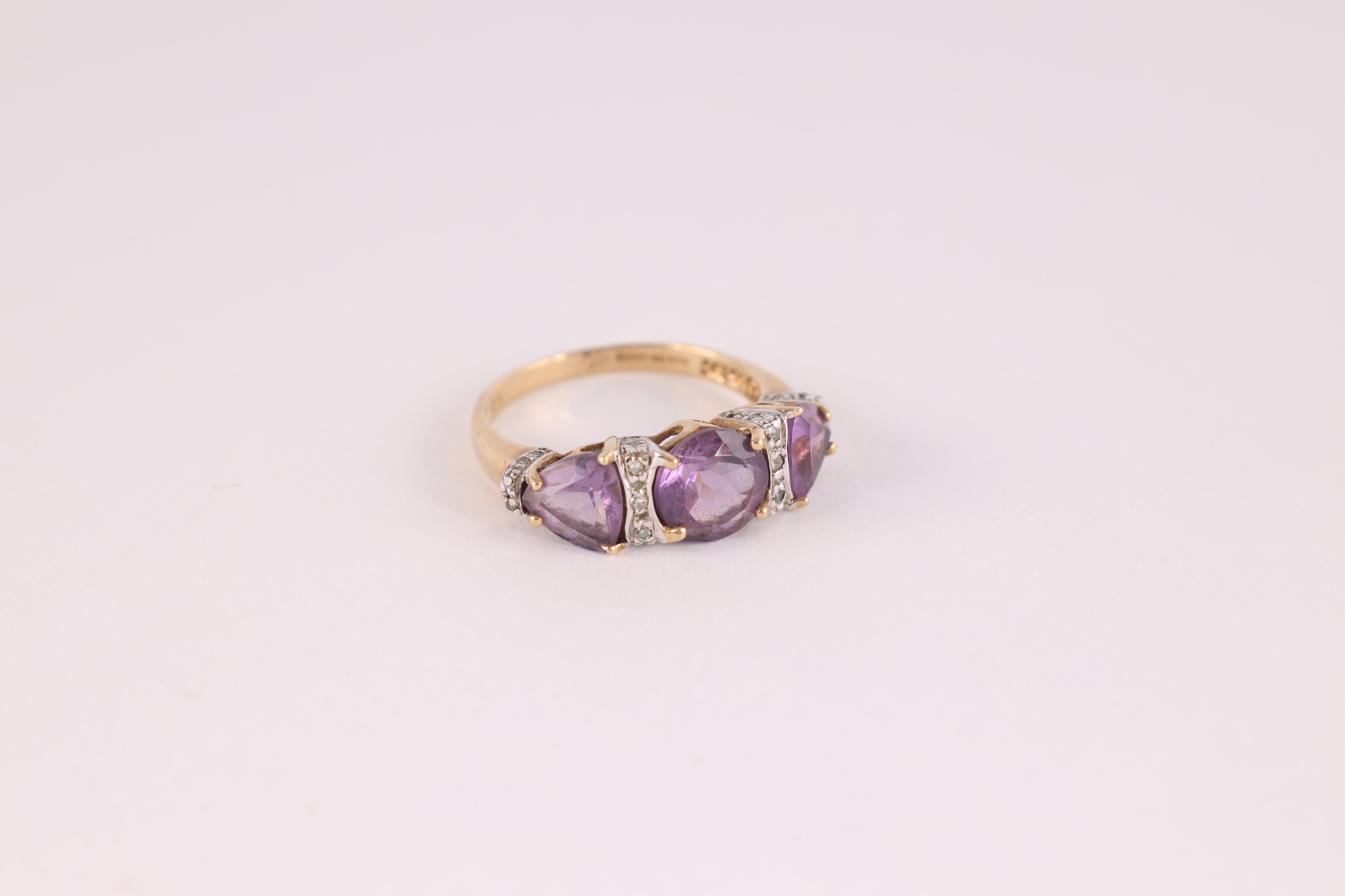 A LADIES 9CT GOLD SMOKEY QUARTZ SOLITAIRE RING the large stone measuring 10mm wide and 12mm, app. - Image 4 of 6