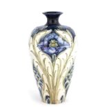 AN EARLY MACINTYRE FLORIAN WARE SMALL TAPERING SHOULDERED VASE tube lined and decorated in the