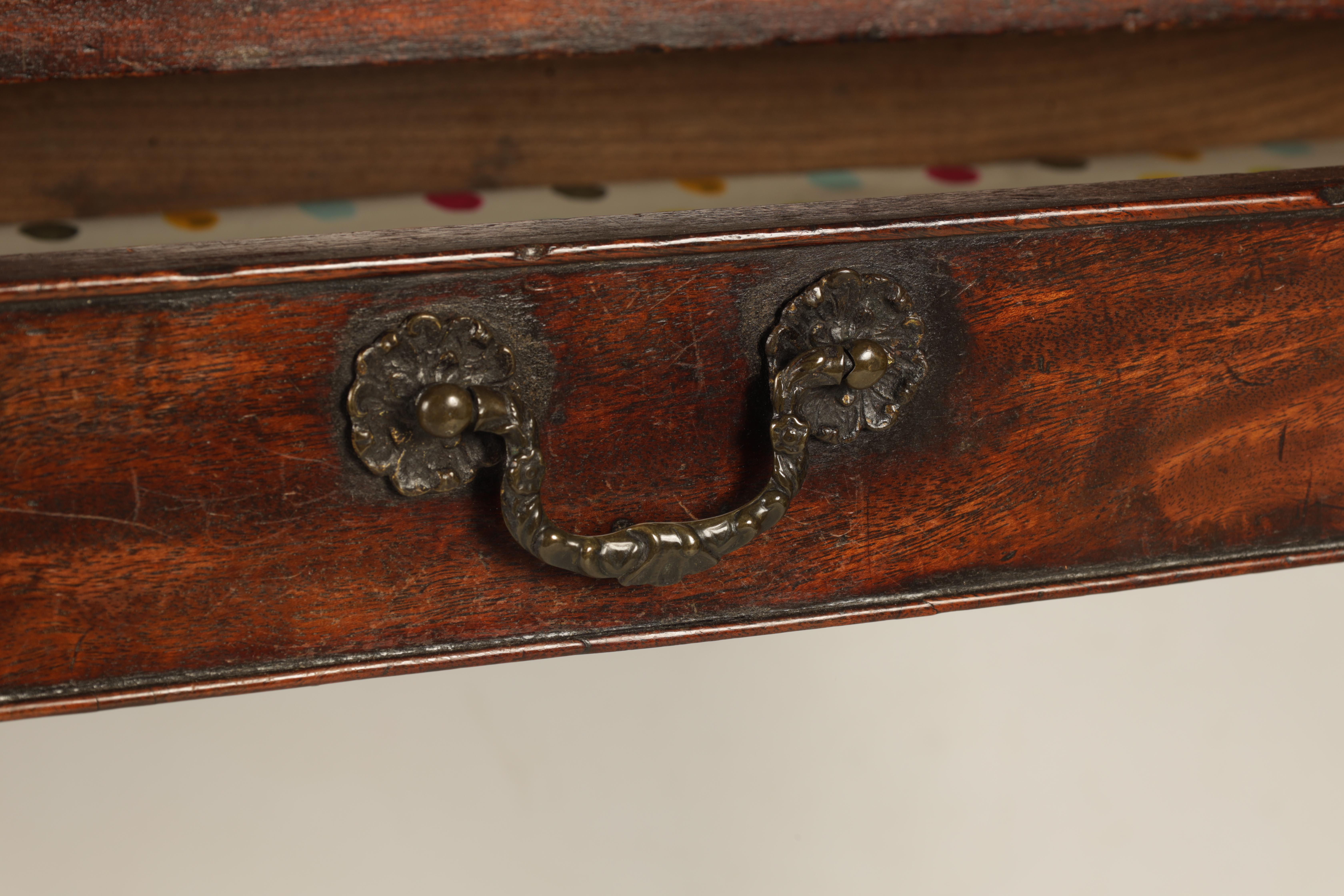 A GEORGE III MAHOGANY TEA TABLE with fold over top above a frieze drawer; standing on square - Image 3 of 6