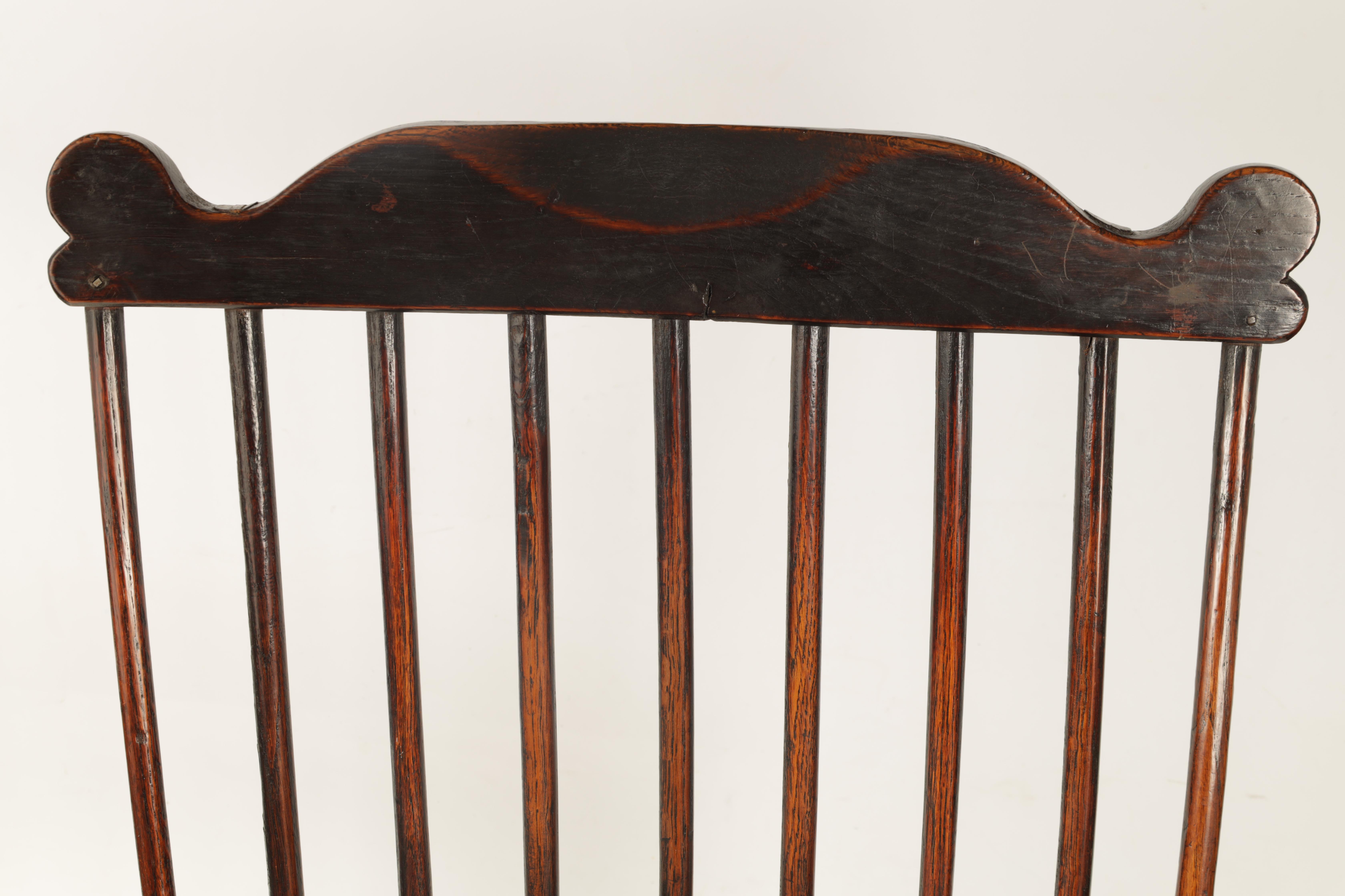 A GOOD 18TH CENTURY THAMES VALLEY OAK AND ELM WINDSOR CHAIR with shaped top rail and flared arms, - Image 6 of 11