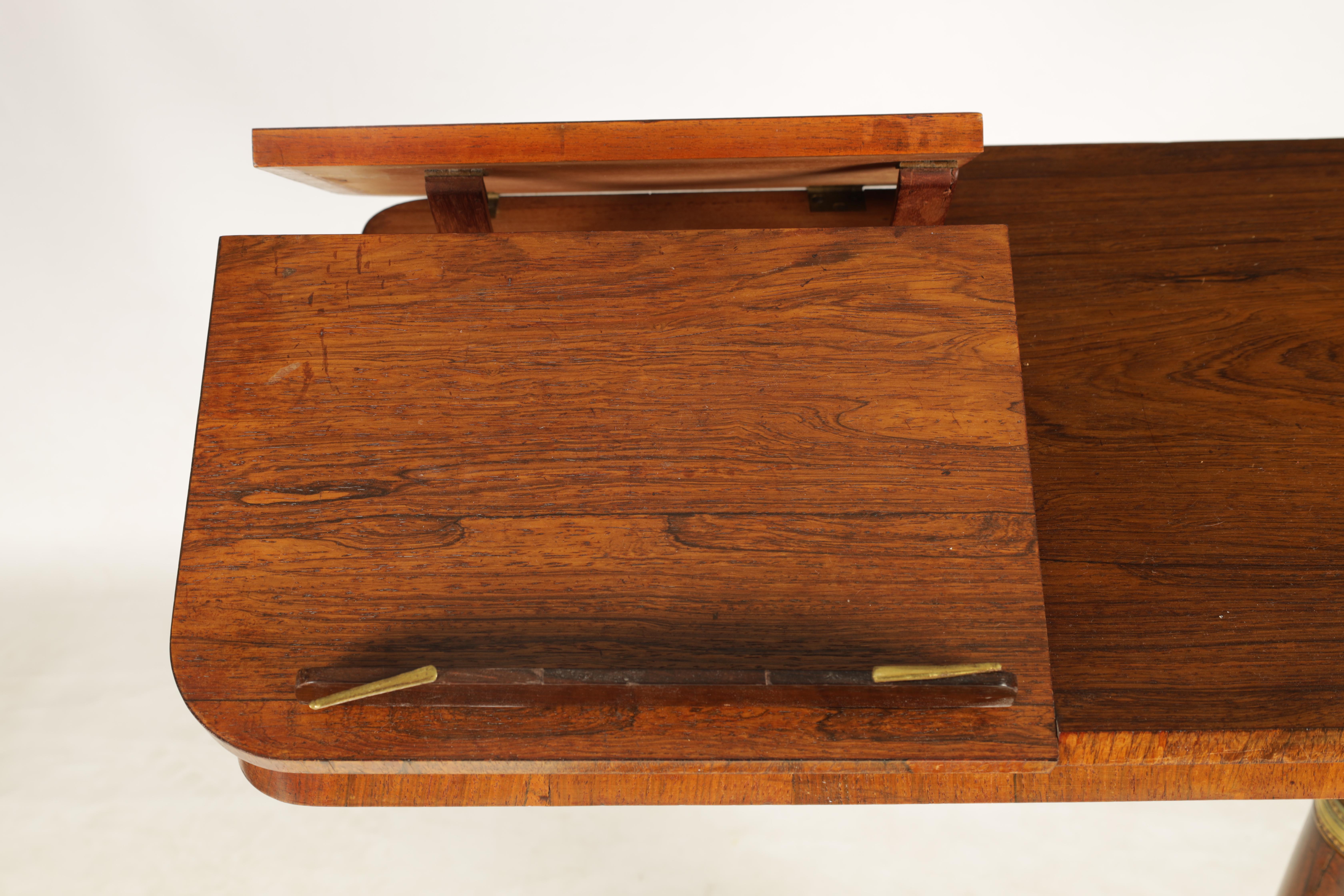 AN UNUSUAL WILLIAM IV ROSEWOOD BEDSIDE READING/ WRITING TABLE with adjustable top and hinged reading - Image 3 of 7