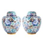 A LARGE PAIR OF 20TH CENTURY ORIENTAL CLOISONNE GINGER JARS AND COVERS with brightly coloured floral