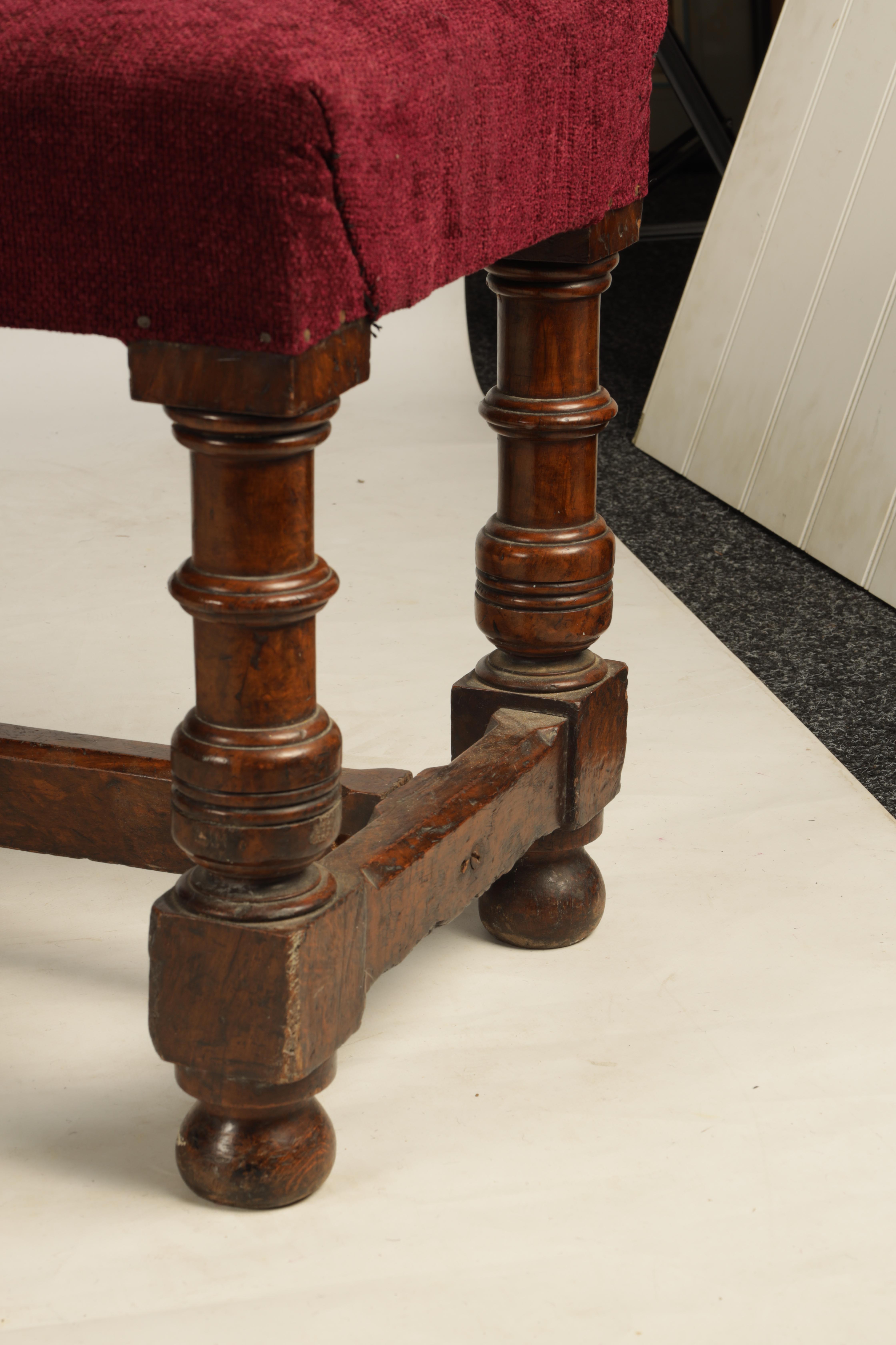 A 19TH CENTURY WALNUT WINDOW SEAT with upholstered top; standing on ring turned legs joined by a H - Image 3 of 7