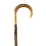 A 19TH CENTURY HORN WALKING CANE possibly rhinoceros 84cm overall