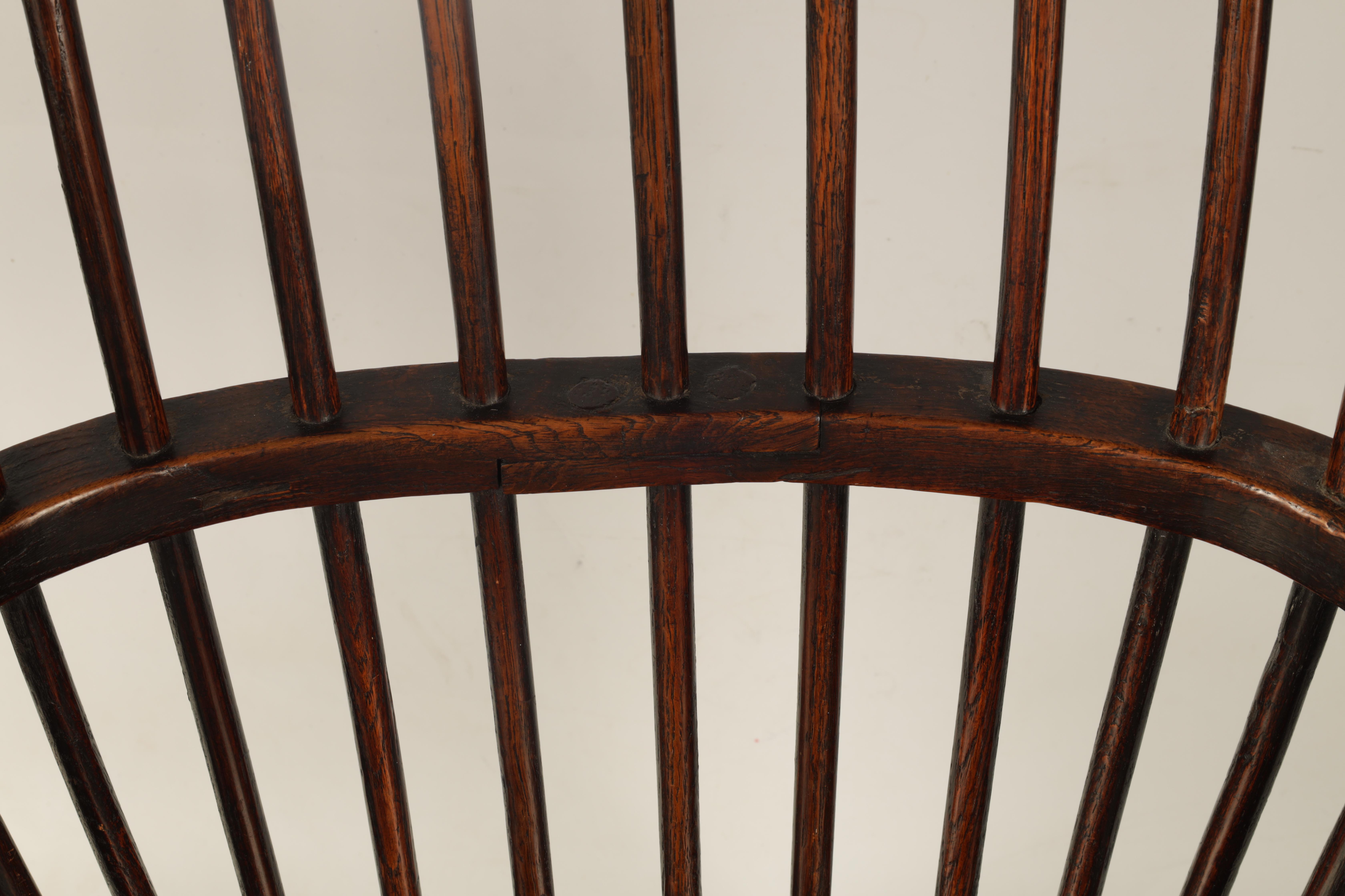 A GOOD 18TH CENTURY THAMES VALLEY OAK AND ELM WINDSOR CHAIR with shaped top rail and flared arms, - Image 5 of 11