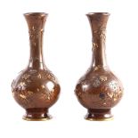 A PAIR OF JAPANESE MEIJI PERIOD PATINATED BRONZE MIXED METAL VASES of globular form with cylindrical