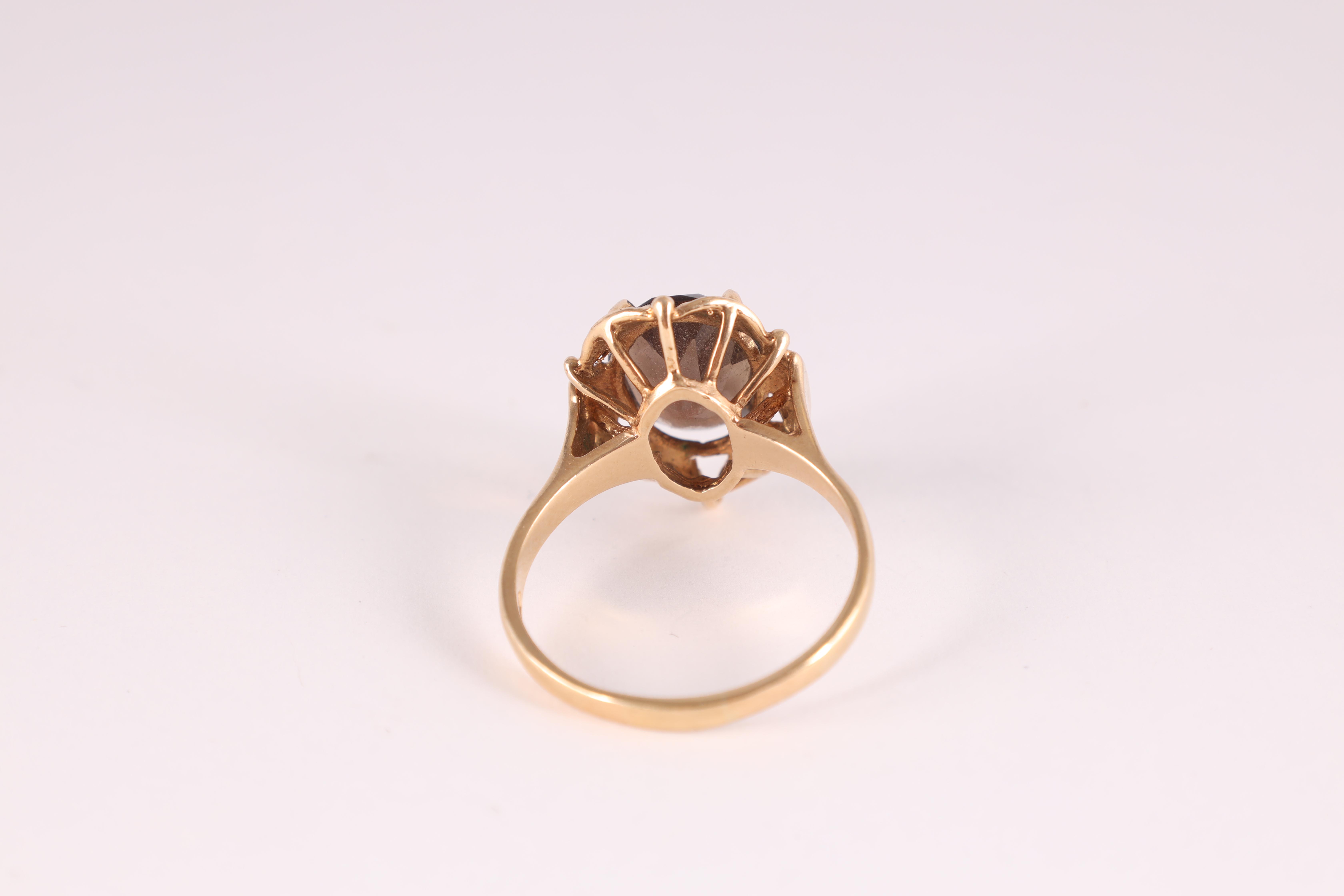 A LADIES 9CT GOLD SMOKEY QUARTZ SOLITAIRE RING the large stone measuring 10mm wide and 12mm, app. - Image 6 of 6