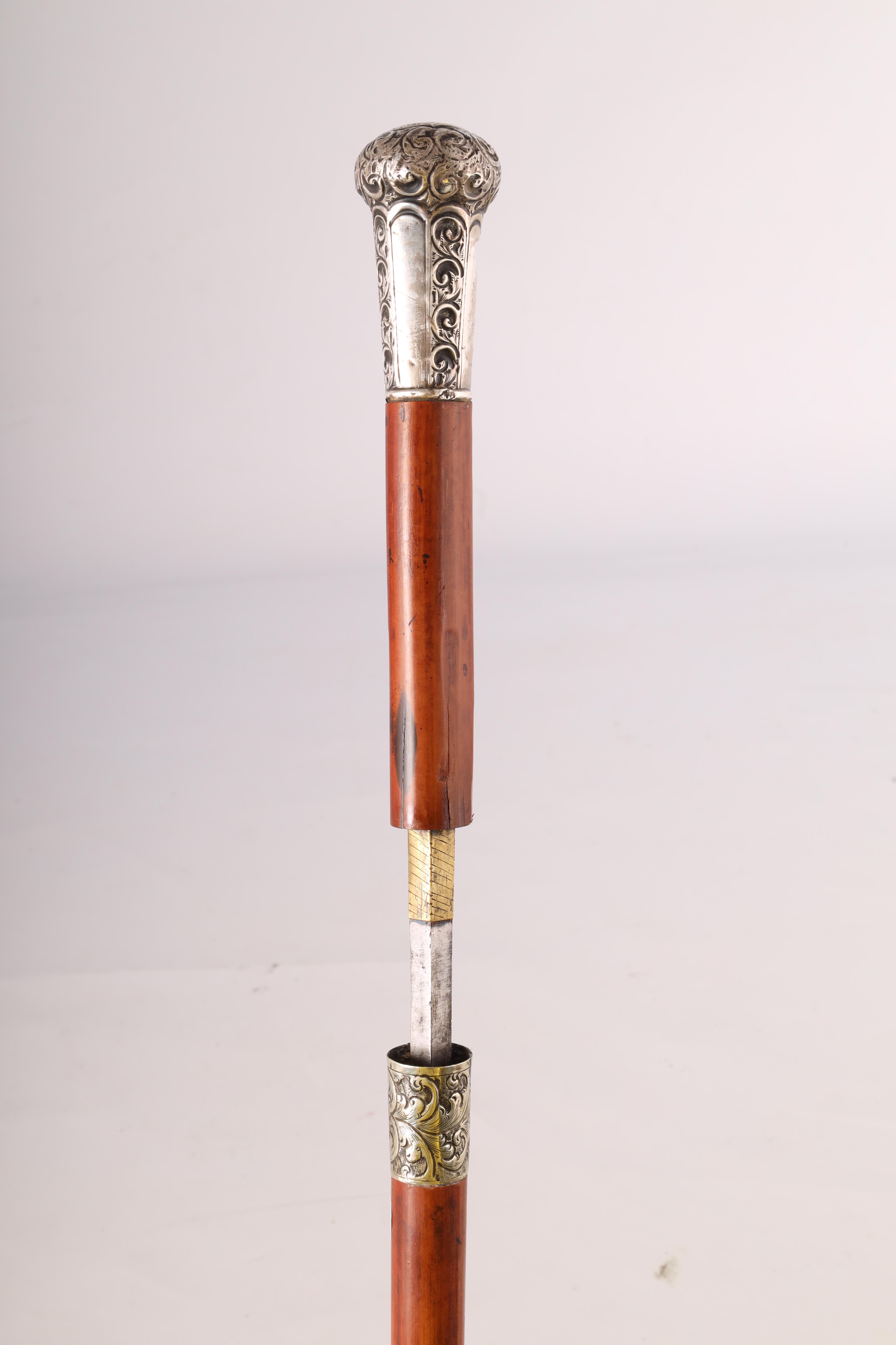 A LATE 19TH CENTURY SILVER TOPPED SWORD STICK with faceted silver pommel and scrollwork decoration - Image 2 of 8