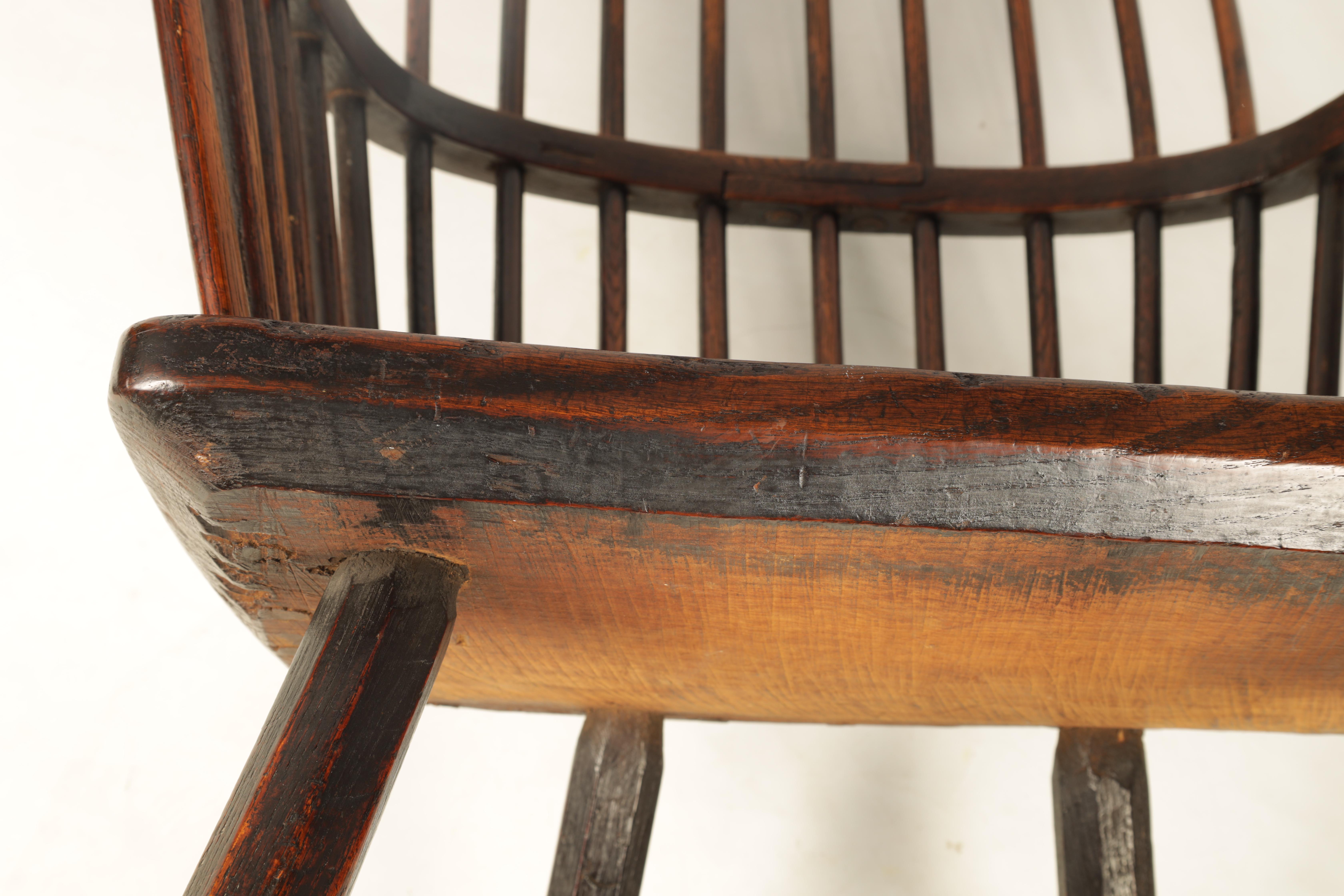 A GOOD 18TH CENTURY THAMES VALLEY OAK AND ELM WINDSOR CHAIR with shaped top rail and flared arms, - Image 11 of 11