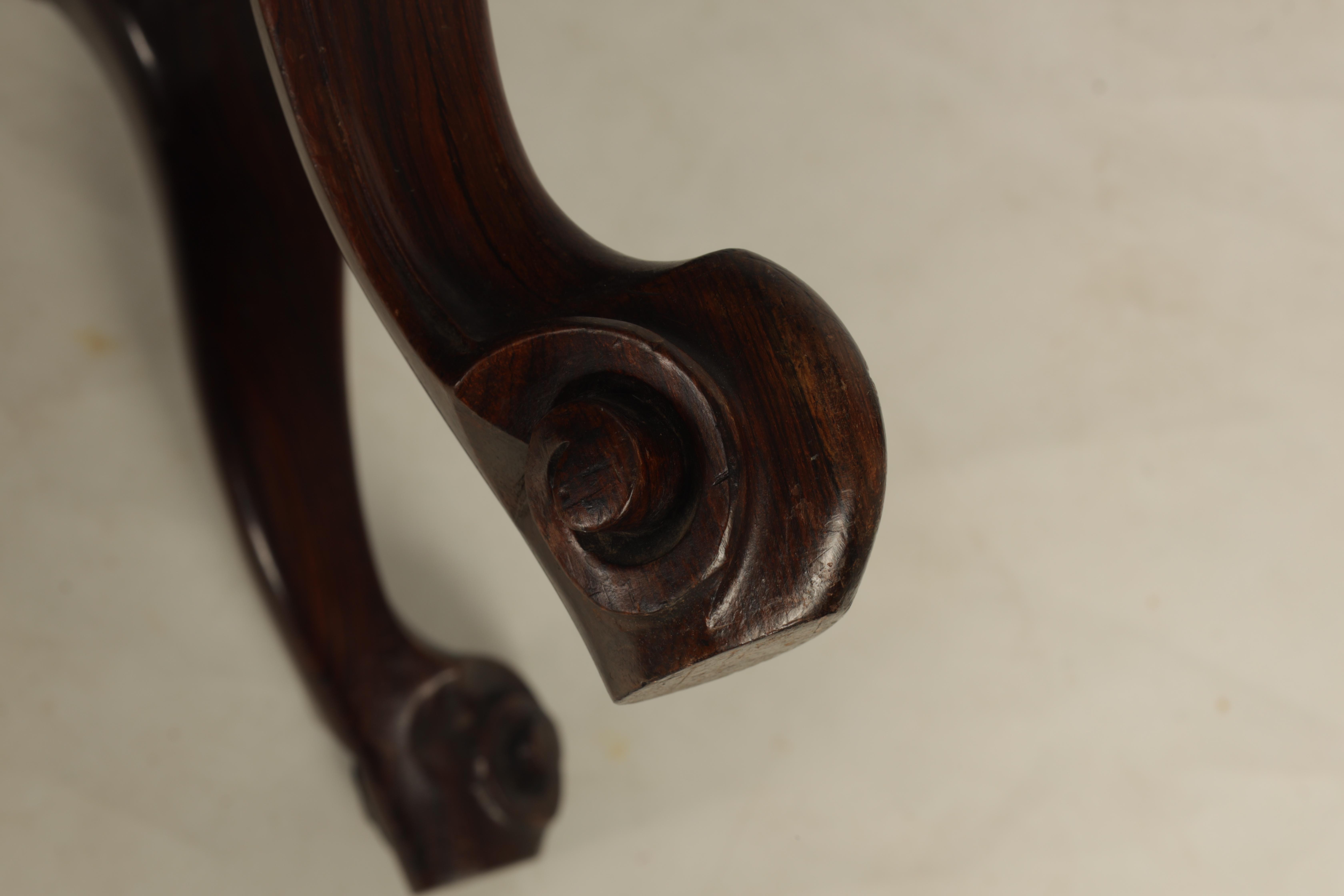 A MID 19TH CENTURY ROSEWOOD DRESSING STOOL of serpentine outline having an upholstered seat with - Image 4 of 4