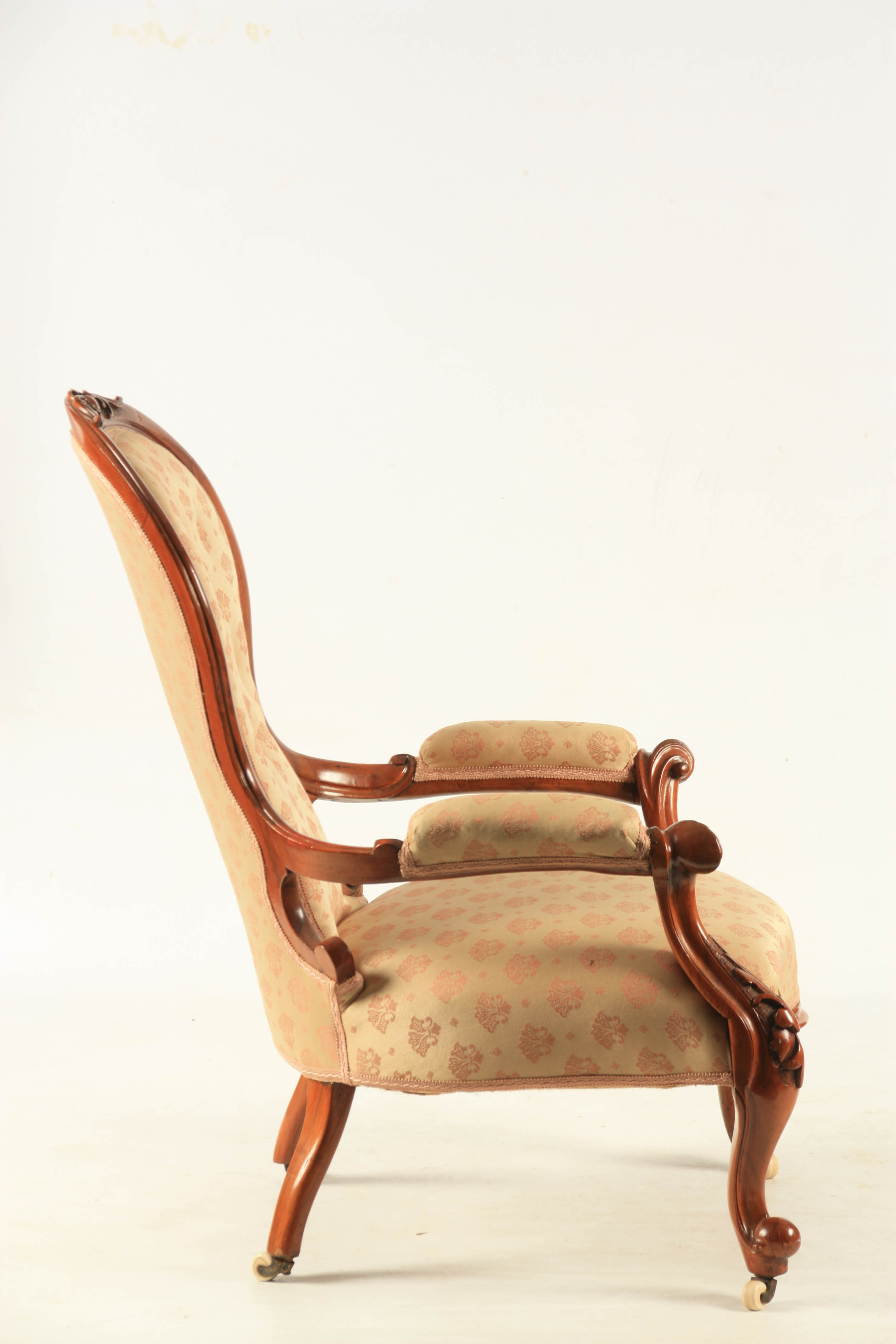 A MID 19TH CENTURY WALNUT UPHOLSTERED DRAWING ROOM CHAIR with shaped button back, joined by open - Image 6 of 8