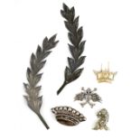 A SELECTION OF SOLID SILVER BADGES AND MOUNTS depicting a pair of hallmarked fern leaves 14cm