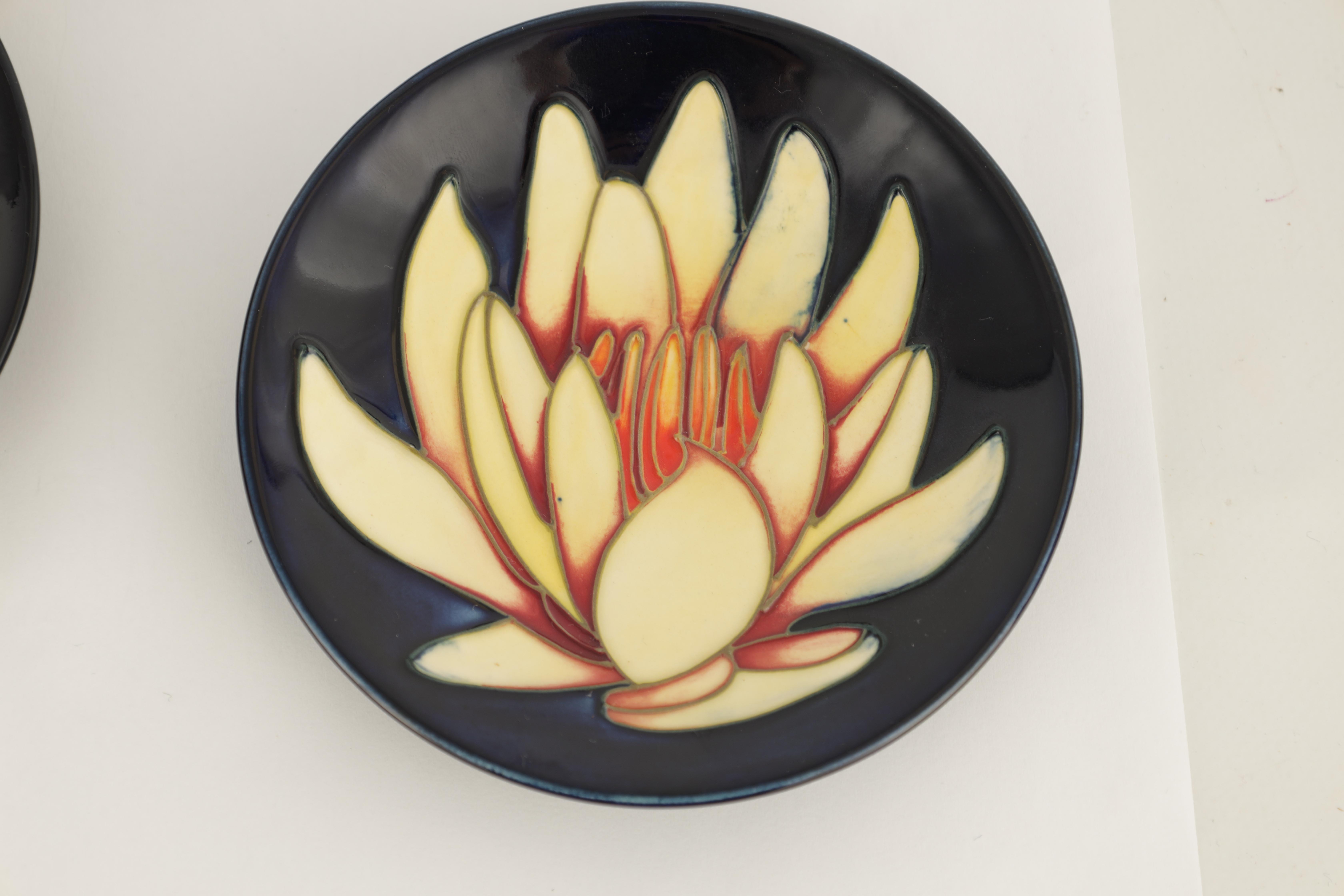 A MOORCROFT DARK BLUE GROUND PIN TRAY tube lined and decorated with a large water lily flowerhead - Image 4 of 7
