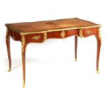 A LATE 19TH CENTURY FRENCH KINGWOOD AND ORMOLU MOUNTED BUREAU PLAT BY MAISON KRIEGER fitted a