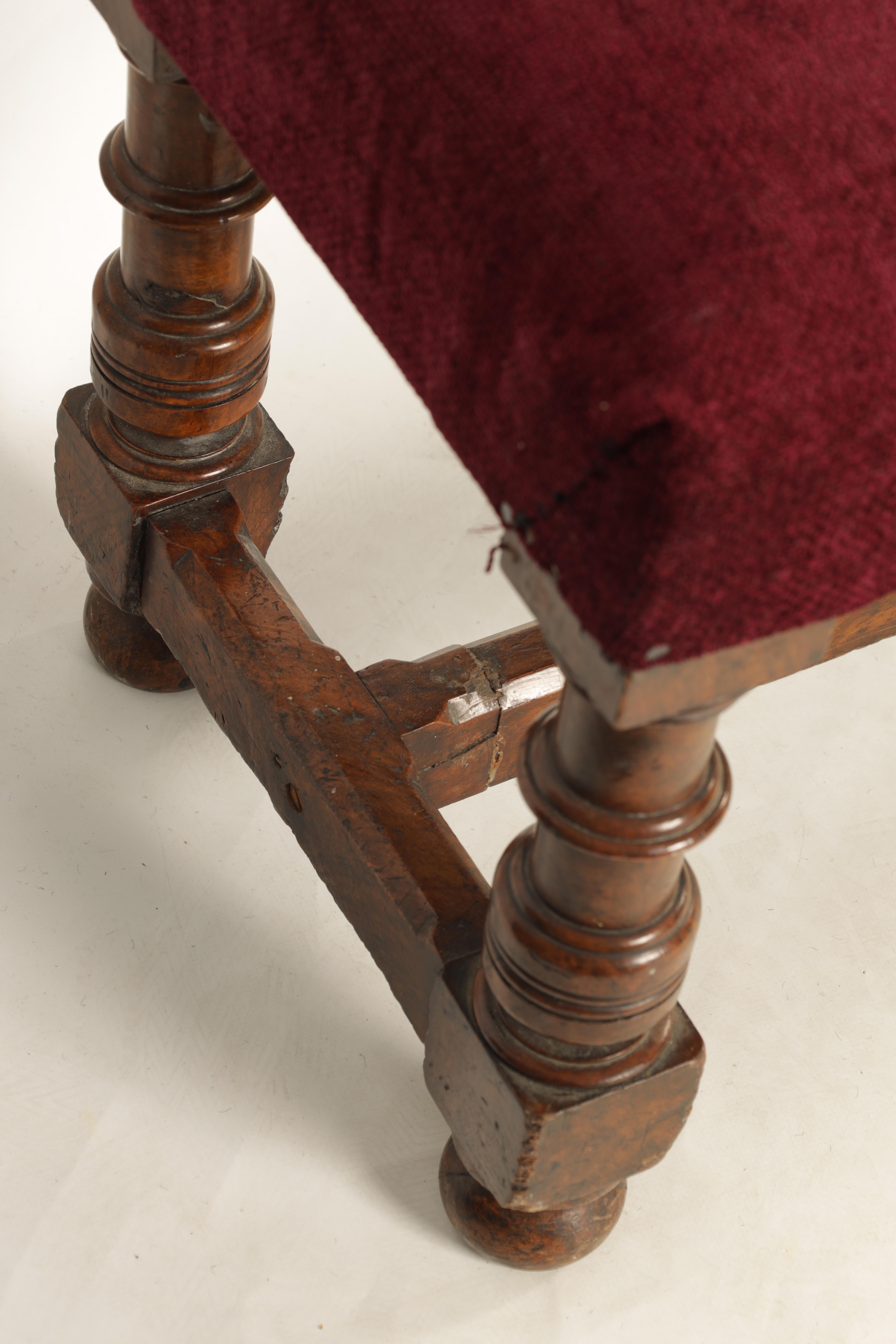 A 19TH CENTURY WALNUT WINDOW SEAT with upholstered top; standing on ring turned legs joined by a H - Image 4 of 7