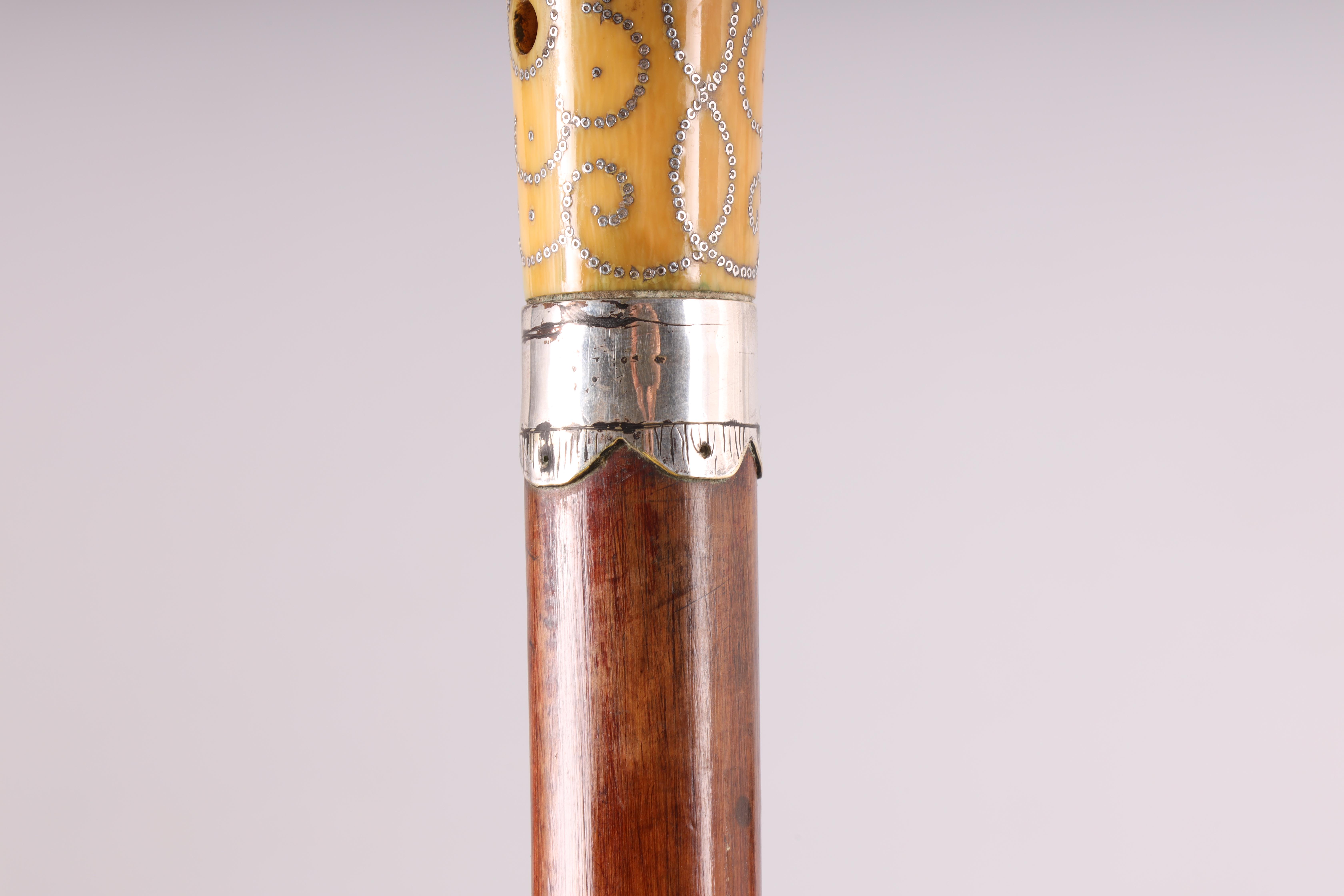 A LATE 17TH CENTURY IVORY AND PIQUE WORK MALACCA WALKING STICK the handle with silver inlaid - Image 6 of 8