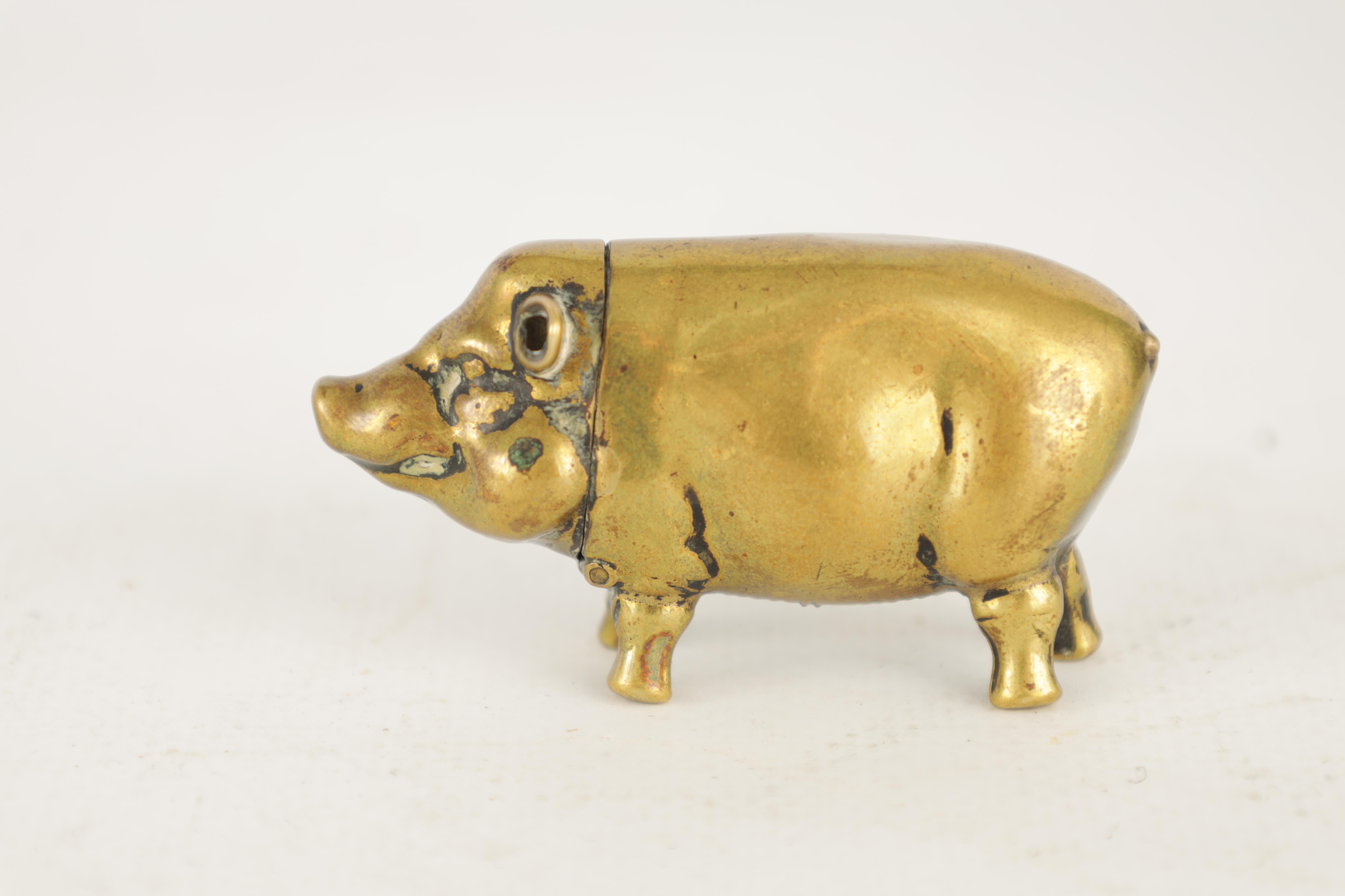 A 19TH CENTURY BRASS VESTA CASE FORMED AS A PIG with hinged head and striker to the belly 6cm wide - Image 3 of 6