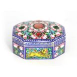 A 20TH CENTURY SILVER METAL AND ENAMEL SNUFF BOX of oblong octagonal form with blue framed