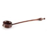 AN 18TH CENTURY TURNED WALNUT TREENWARE LADLE with bulbous turned handle and ring turned bowl 33cm