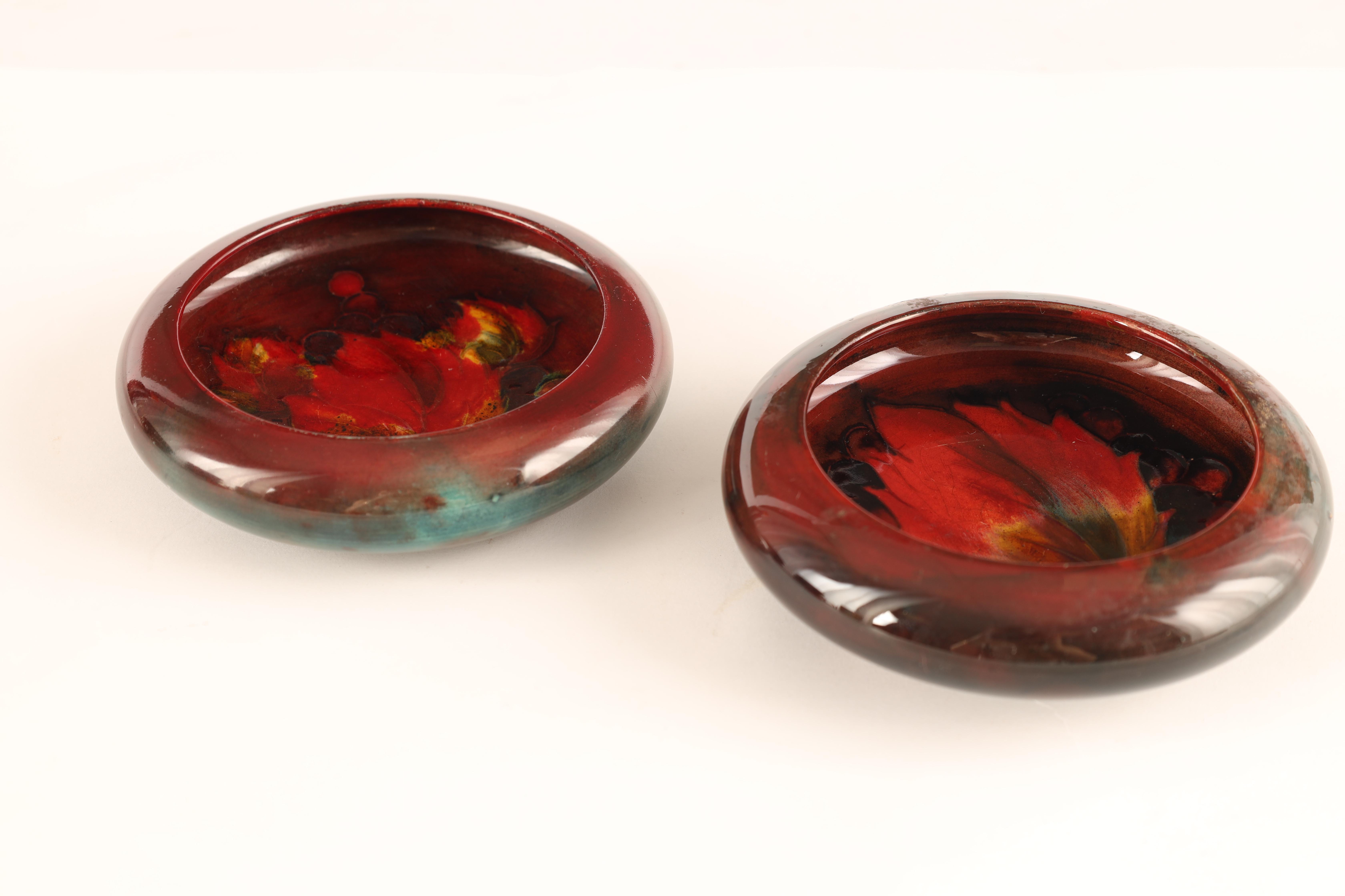 A NEAR PAIR OF MOORCROFT SHALLOW SMALL DISHES WITH CURVED RIMS both decorated in the Autumn Leaf and - Image 2 of 7