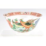 AN 18TH CENTURY CHINESE FAMILLE VERTE PORCELAIN BOWL BEARING KANGXI MARKS decorated with birds