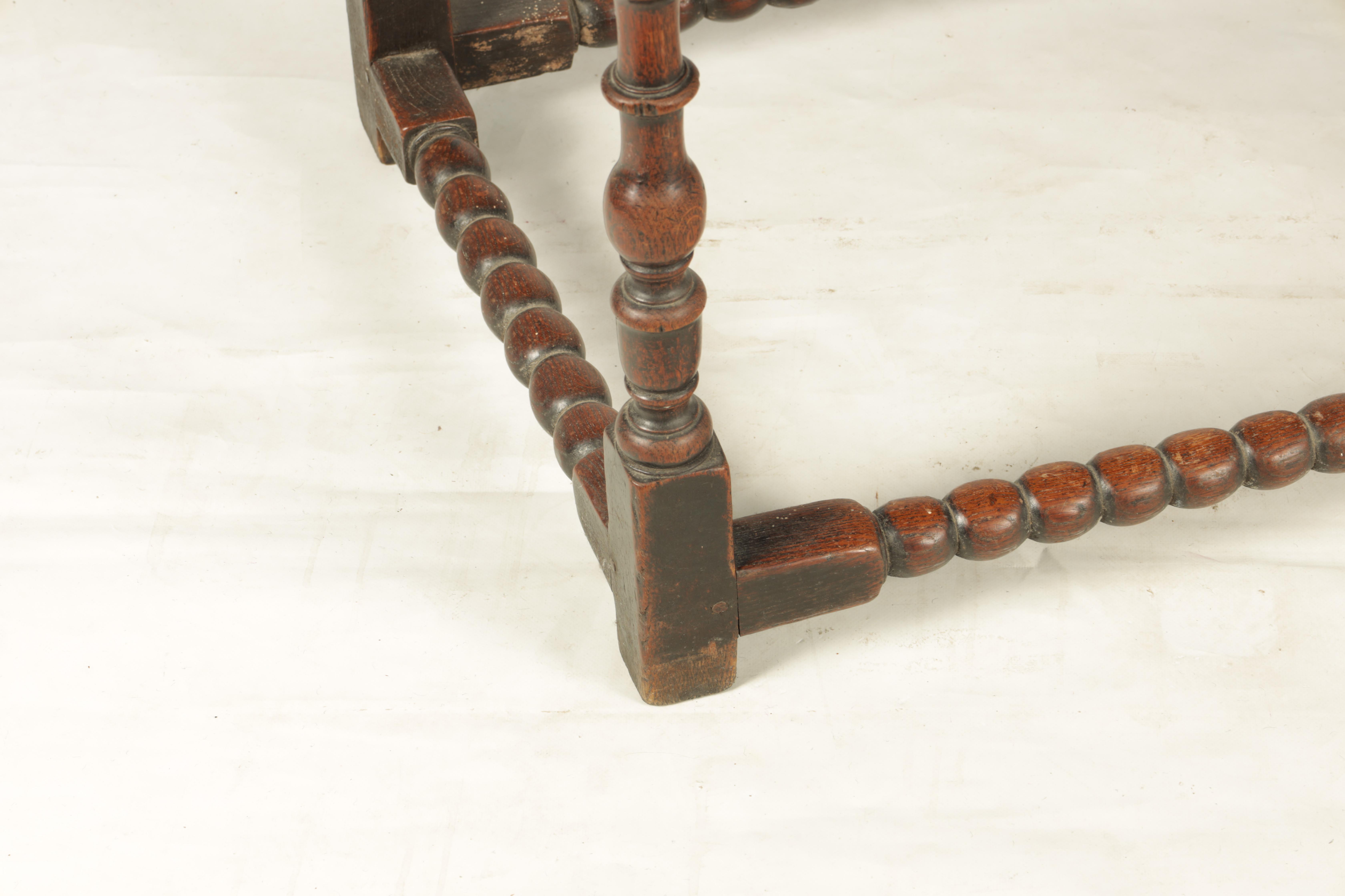 A 17TH CENTURY JOINED OAK SIDE TABLE with panelled frieze drawer and shaped pierced corner blocks; - Image 2 of 8