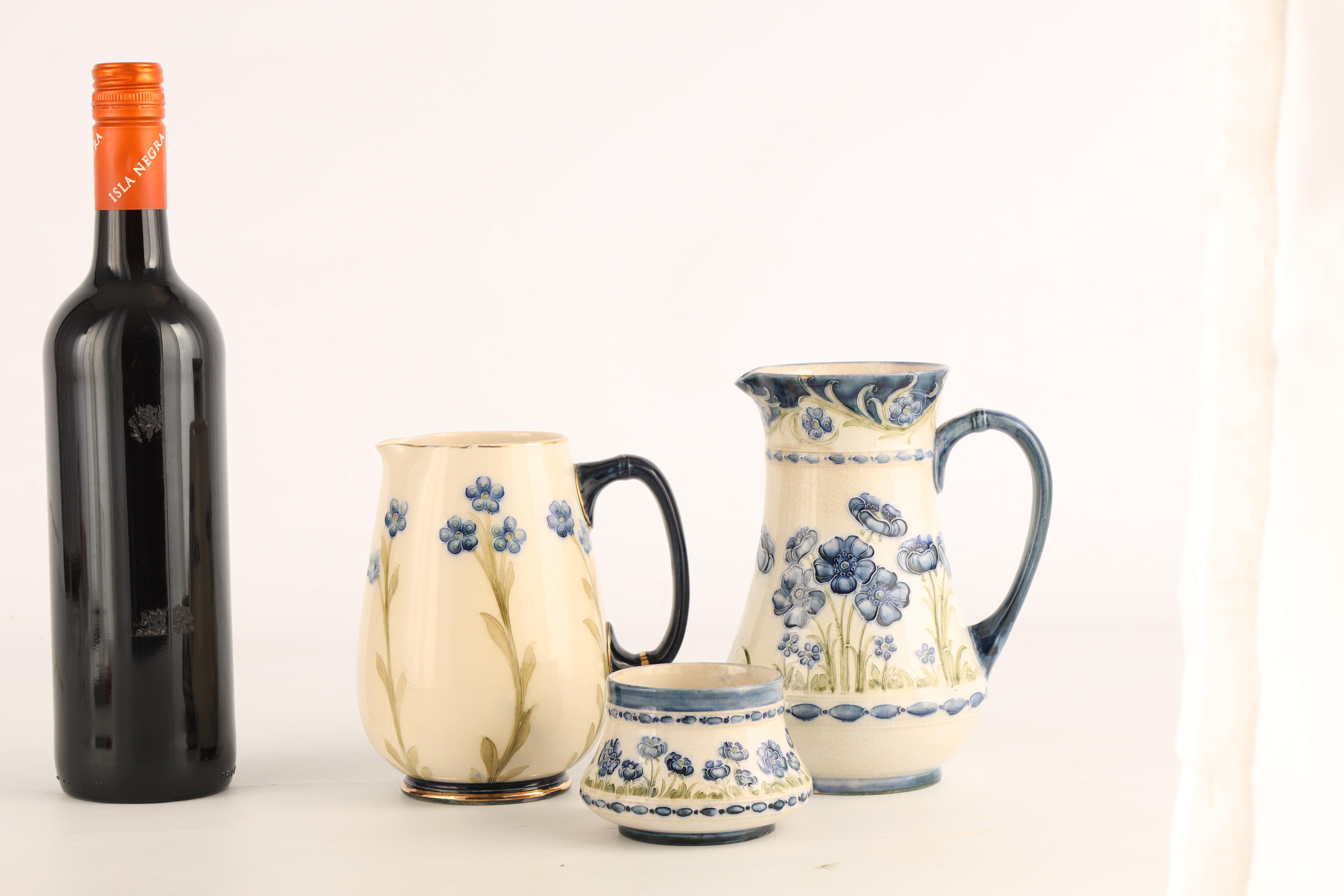 A JAMES MACINTYRE AND CO BURSLEM BULBOUS JUG tube lined and decorated in the blue poppy pattern - Image 2 of 9