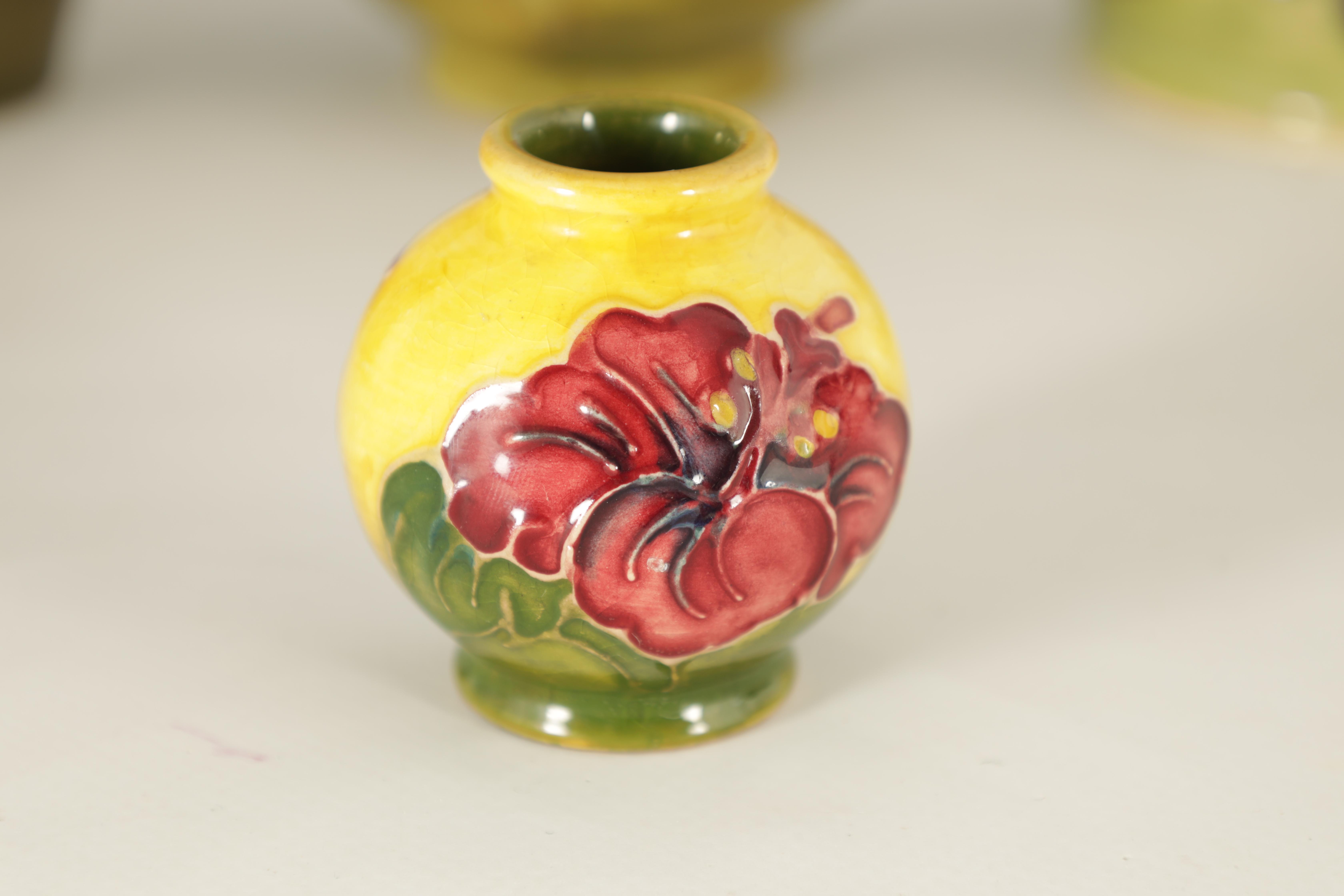 A MOORCROFT MINIATURE BULBOUS CABINET VASE tube lined and decorated with hibiscus flowerhead - Image 3 of 8