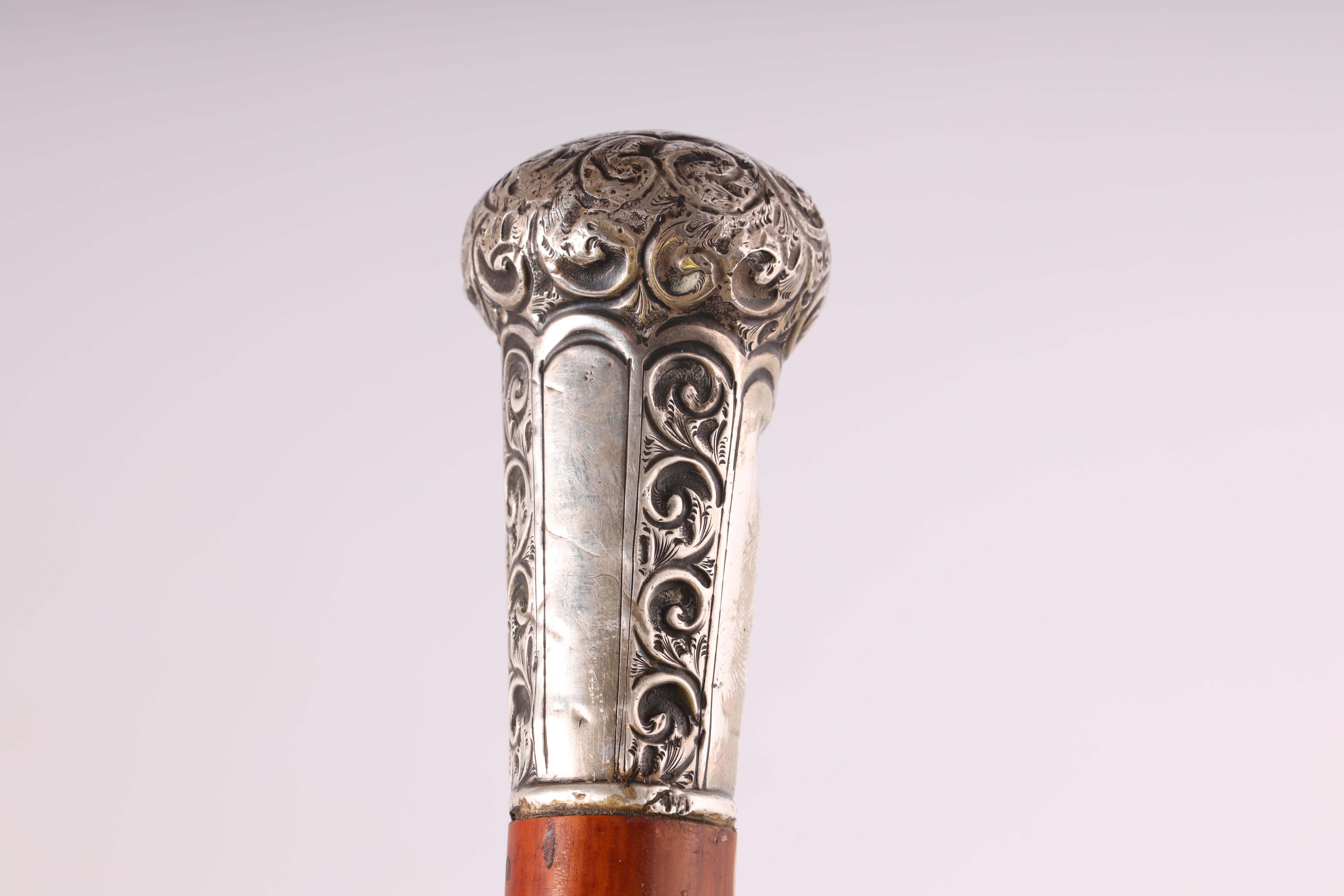 A LATE 19TH CENTURY SILVER TOPPED SWORD STICK with faceted silver pommel and scrollwork decoration - Image 4 of 8