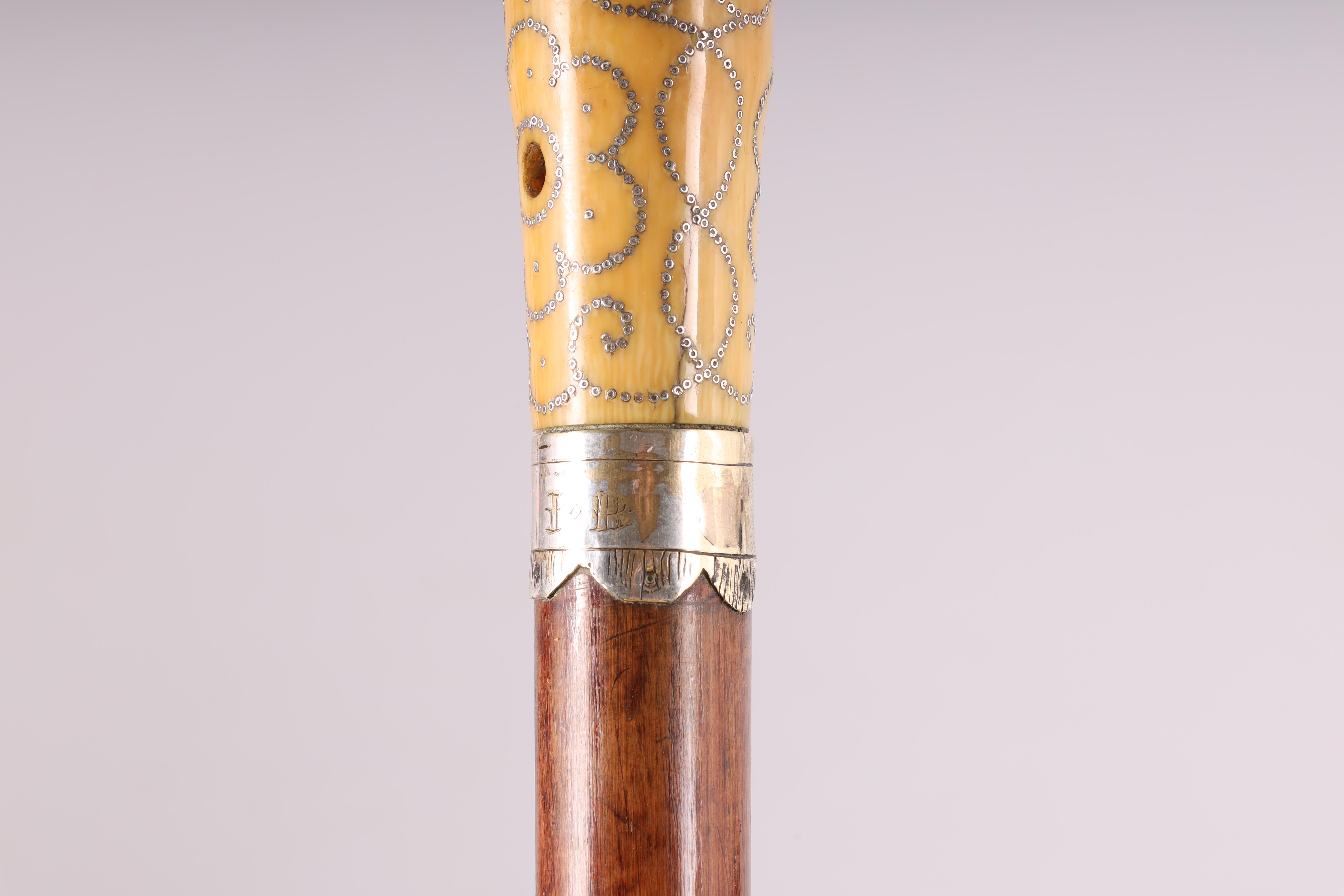 A LATE 17TH CENTURY IVORY AND PIQUE WORK MALACCA WALKING STICK the handle with silver inlaid - Image 3 of 8