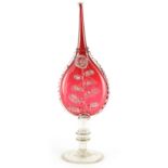 A 19TH CENTURY CRANBERRY AND CLEAR GLASS BELLOWS SHAPED VASE with applied and crimped decoration