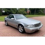 AN SL 280 MERCEDES BENZ 2.8 LITRE AUTOMATIC with a panoramic removable hardtop in silver, black