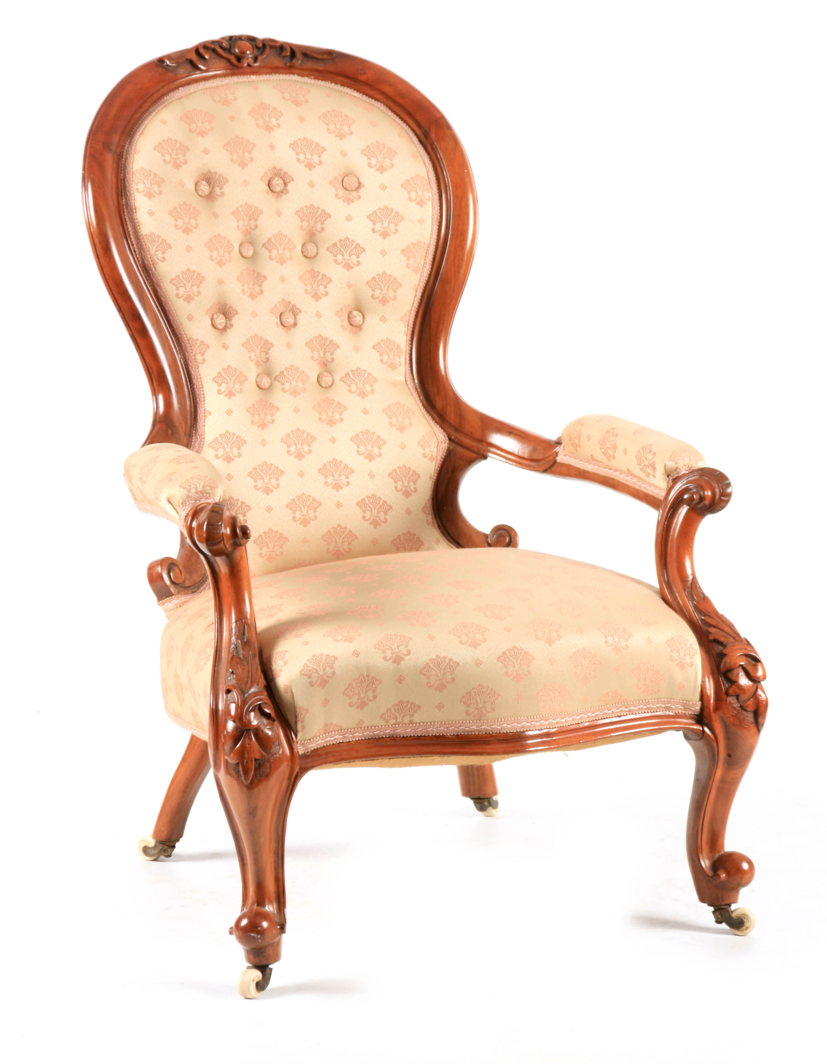 A MID 19TH CENTURY WALNUT UPHOLSTERED DRAWING ROOM CHAIR with shaped button back, joined by open