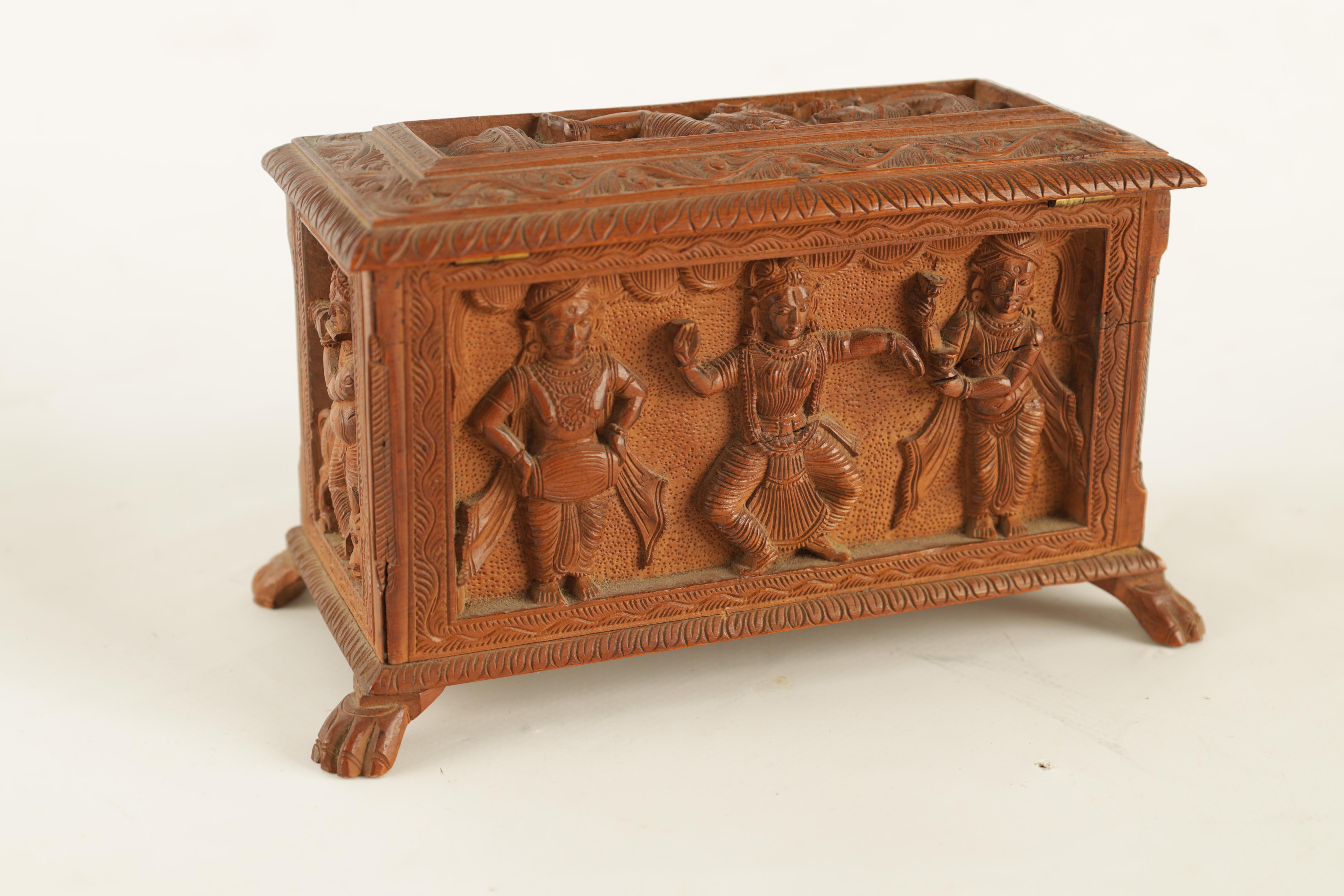 AN EARLY 20TH CENTURY ANGLO-INDIAN CARVED SANDALWOOD BOX with relief carved panels of various Indian - Image 6 of 8