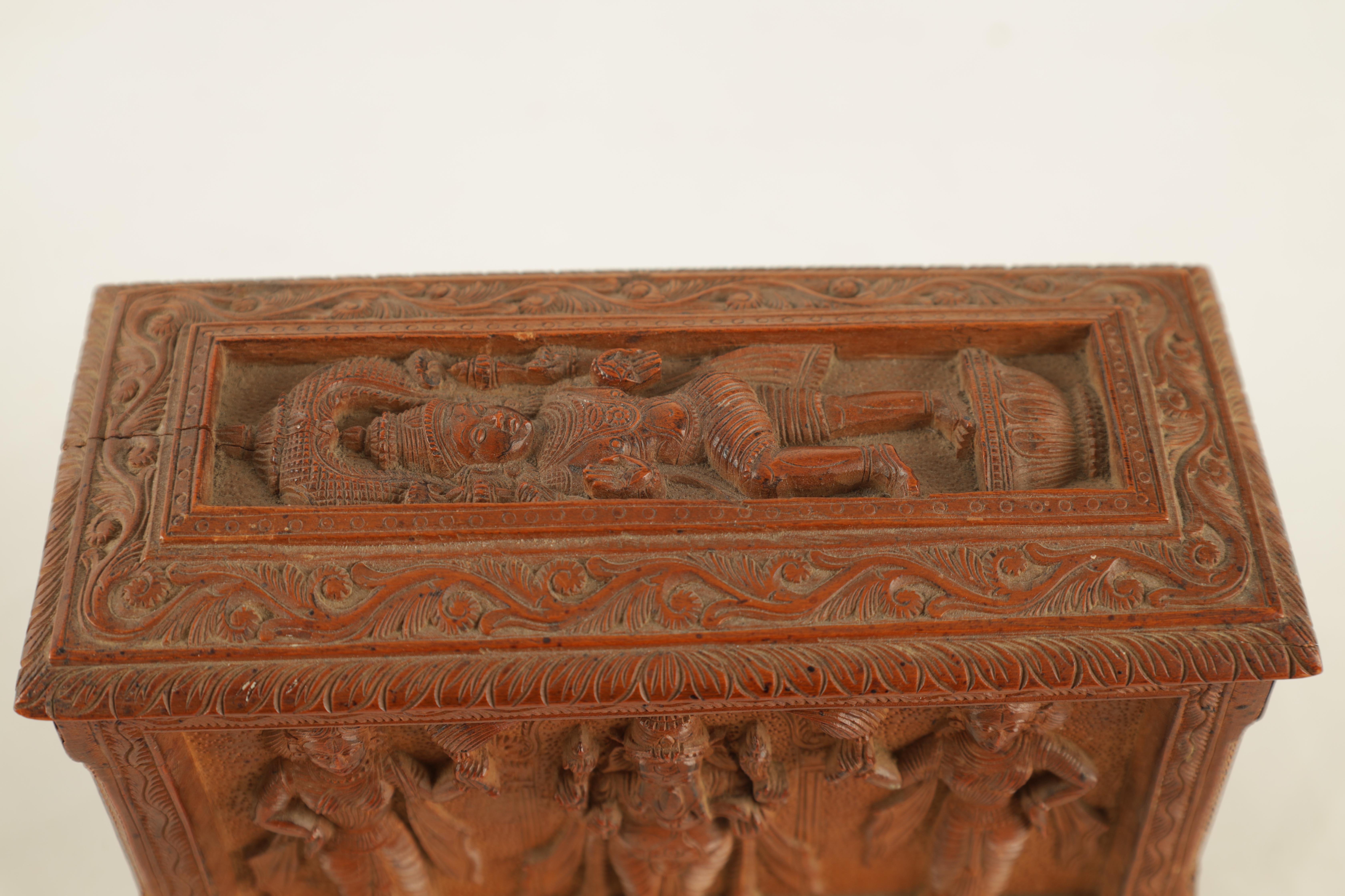 AN EARLY 20TH CENTURY ANGLO-INDIAN CARVED SANDALWOOD BOX with relief carved panels of various Indian - Image 2 of 8