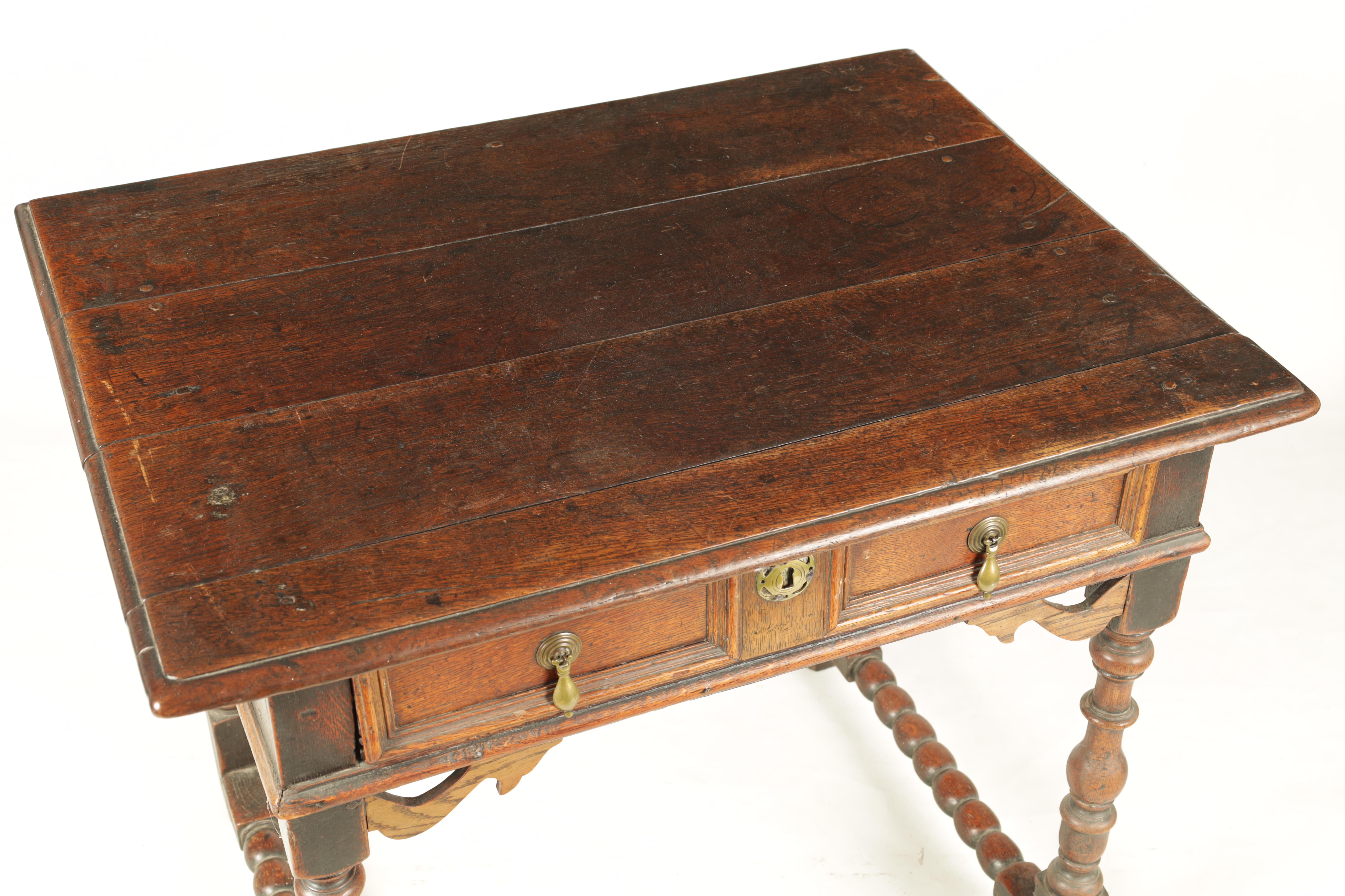 A 17TH CENTURY JOINED OAK SIDE TABLE with panelled frieze drawer and shaped pierced corner blocks; - Image 3 of 8