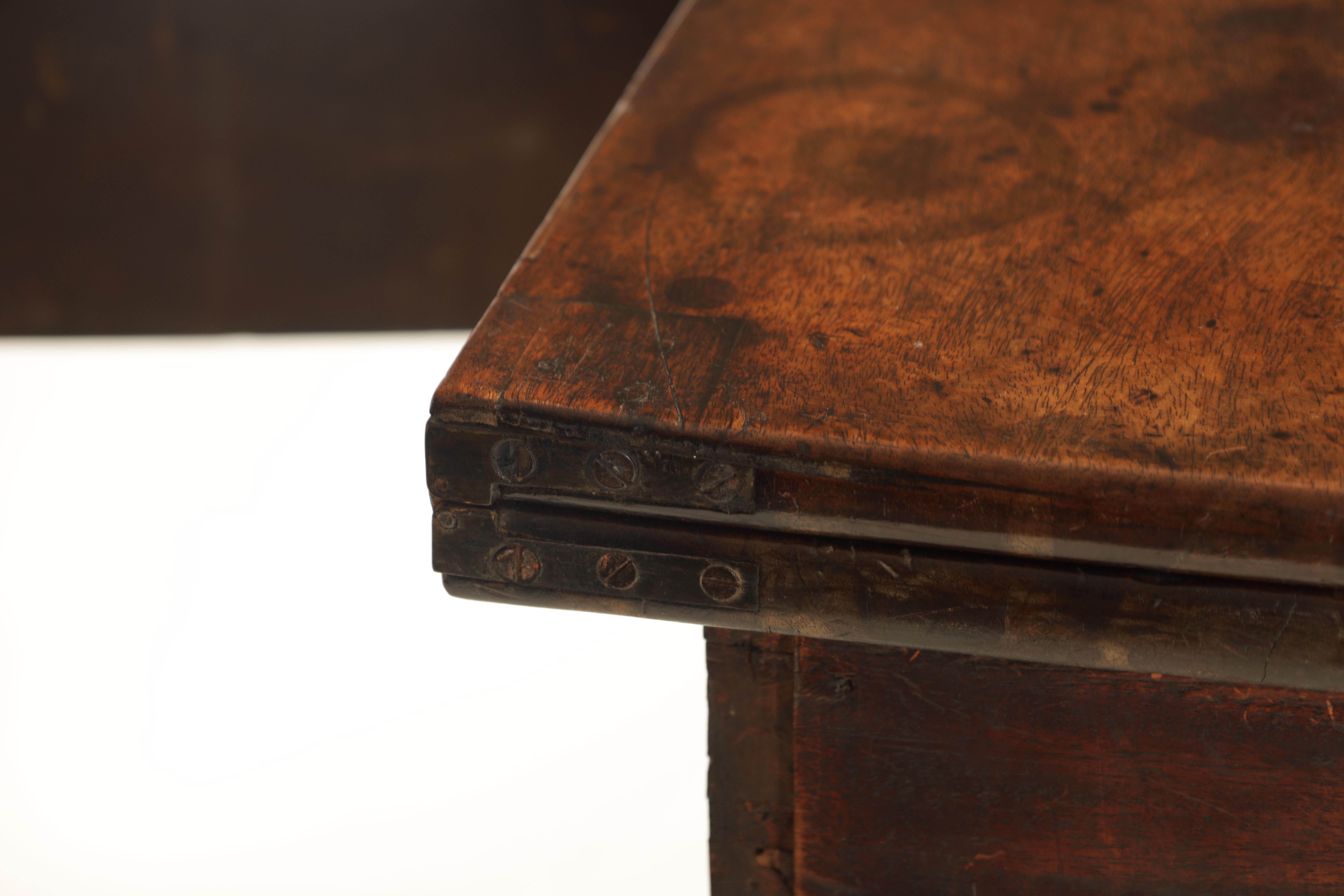 A GEORGE III MAHOGANY TEA TABLE with fold over top above a frieze drawer; standing on square - Image 5 of 6