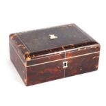 A 19TH CENTURY TORTOISESHELL VENEERED JEWELLERY BOX the slightly domed lid with silver cartouche and