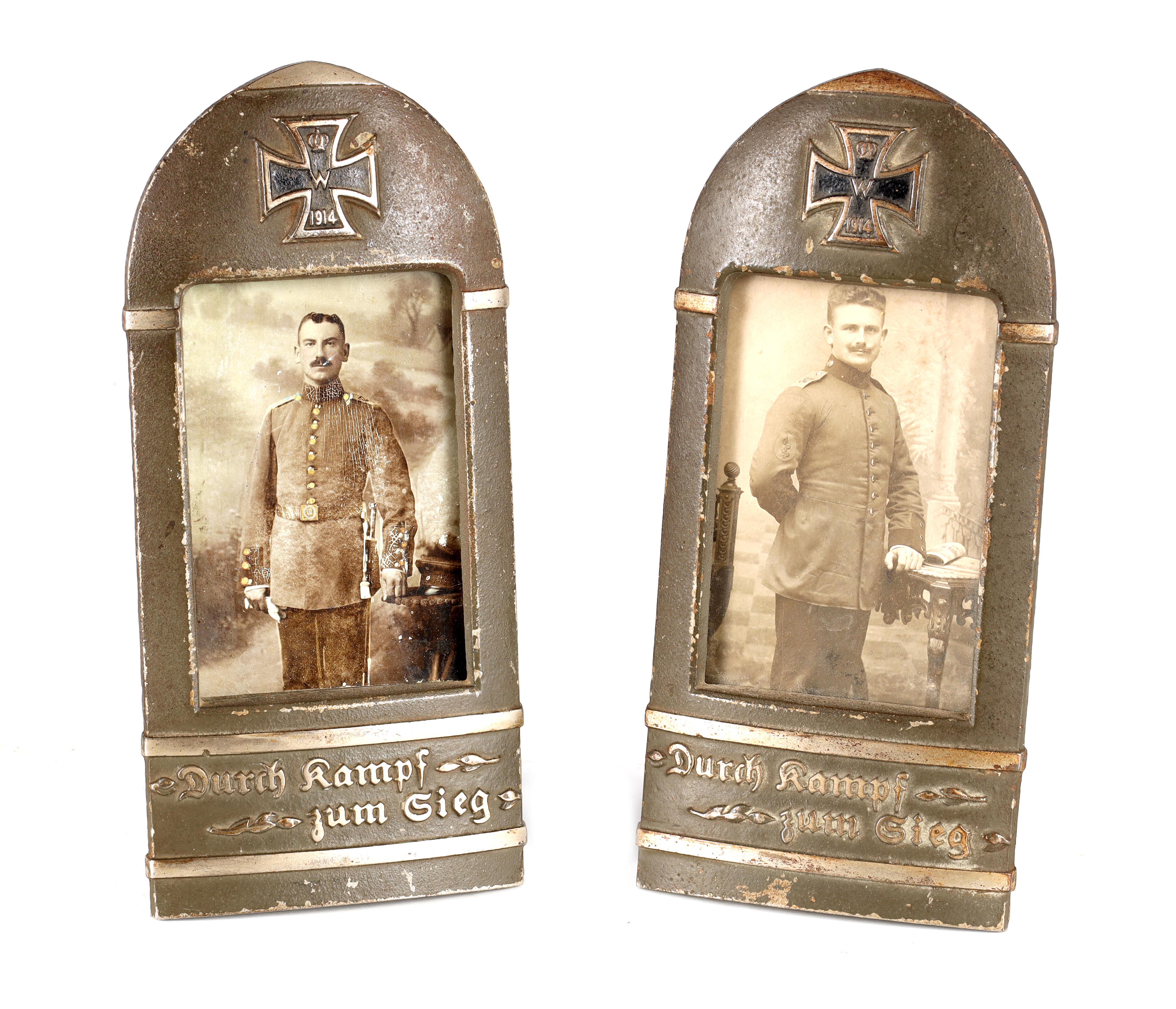 A PAIR OF WWI GERMAN PICTURE FRAMES of bullet-shape with imperial iron cross and raised G text