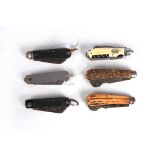 A GOOD COLLECTION OF SIX 19TH AND 20TH CENTURY FOLDING KNIVES two with chequered black handles one
