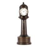 A LATE 19TH CENTURY FRENCH INDUSTRIAL LIGHTHOUSE CLOCK the patinated bronze domed top case with