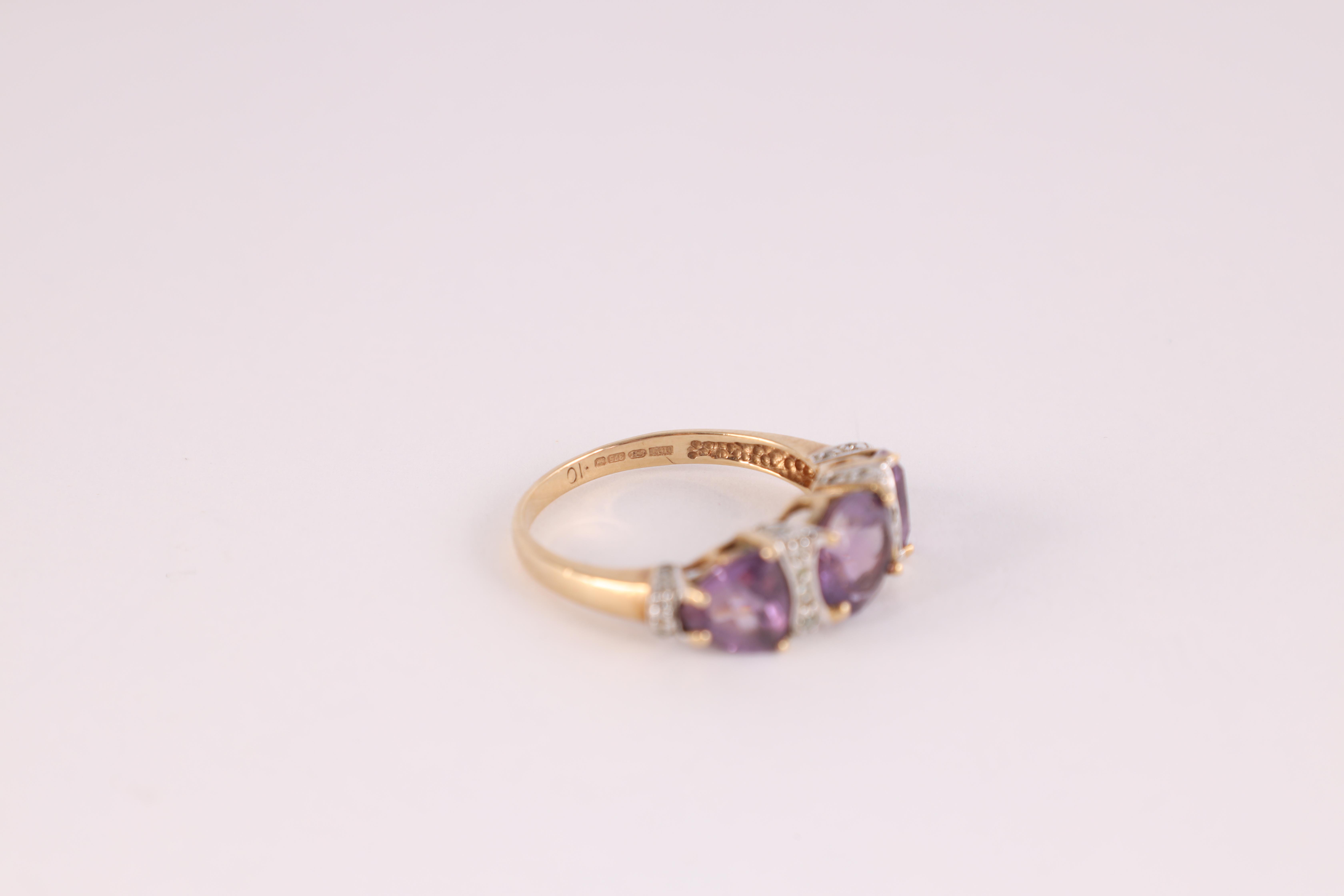 A LADIES 9CT GOLD SMOKEY QUARTZ SOLITAIRE RING the large stone measuring 10mm wide and 12mm, app. - Image 3 of 6