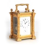 A.W. GRANGE, PARIS A MID 19TH CENTURY FRENCH GILT ENGRAVED REPEATING CARRIAGE CLOCK WITH ALARM the