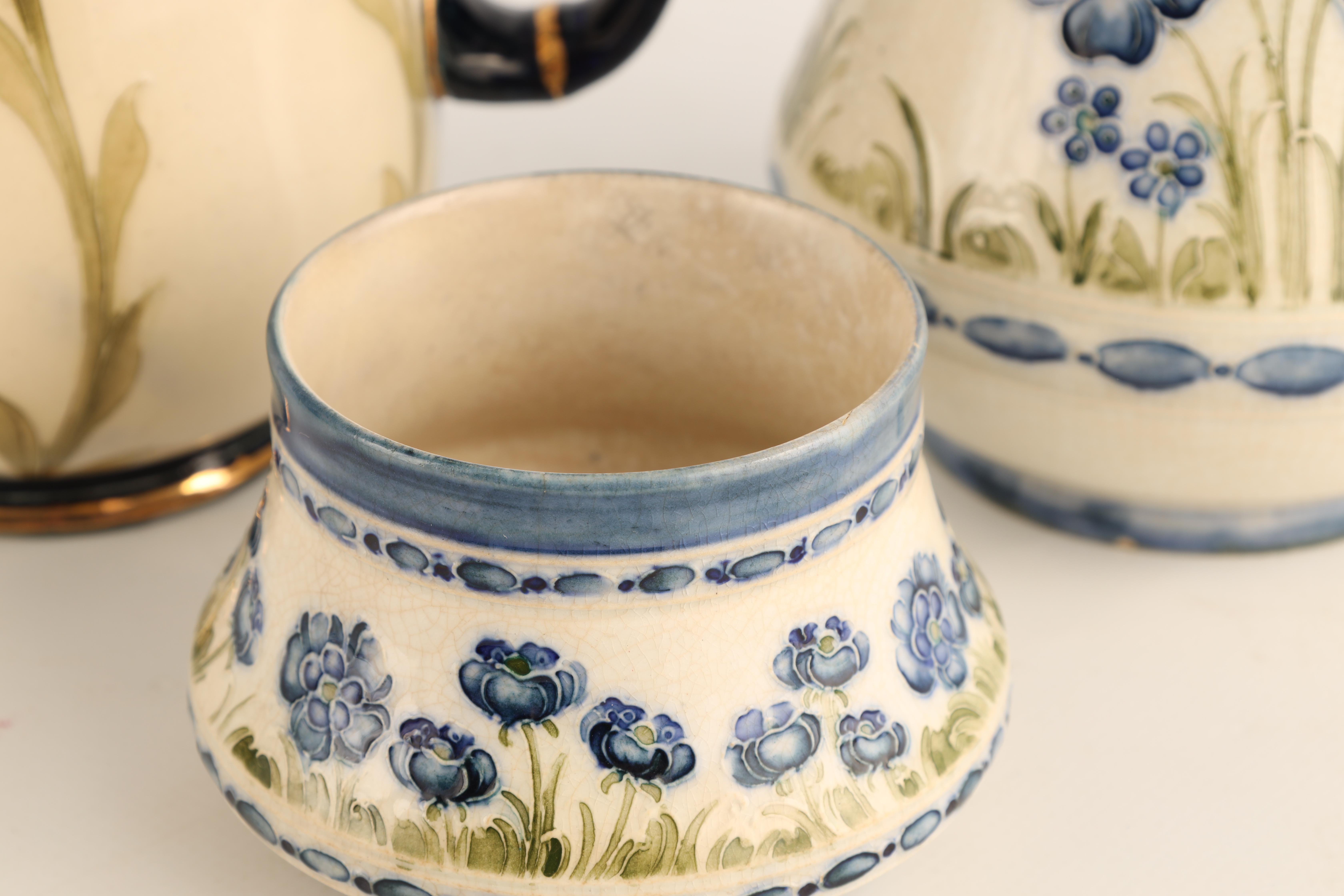 A JAMES MACINTYRE AND CO BURSLEM BULBOUS JUG tube lined and decorated in the blue poppy pattern - Image 4 of 9