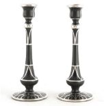 A PAIR OF 20TH CENTURY BLACK AMETHYST GLASS AND STERLING SILVER OVERLAY SLENDER CANDLESTICKS 26.