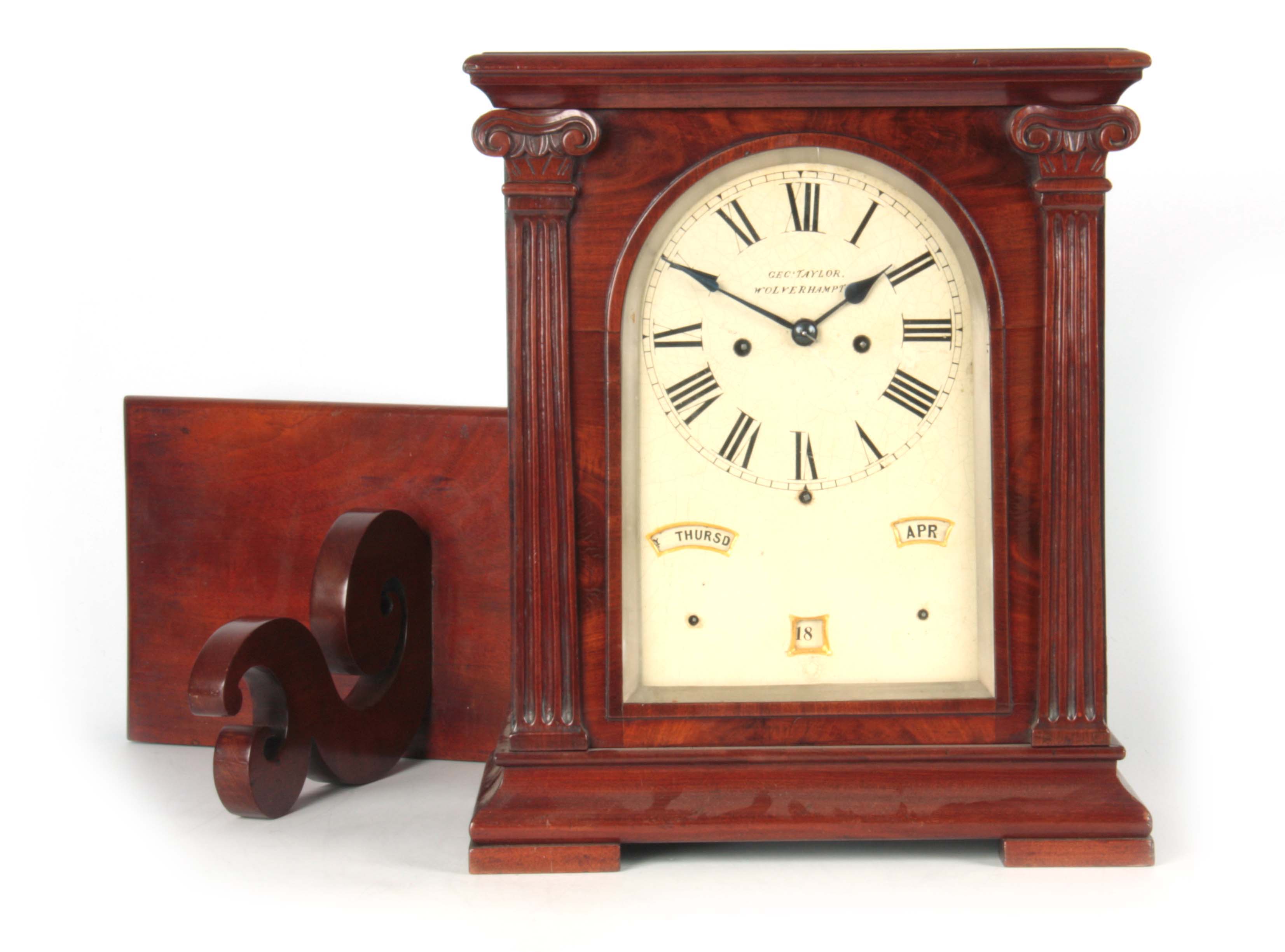 GEORGE TAYLOR, WOLVERHAMPTON A RARE FIGURED MAHOGANY PERPETUAL CALENDAR BRACKET CLOCK ON BRACKET the